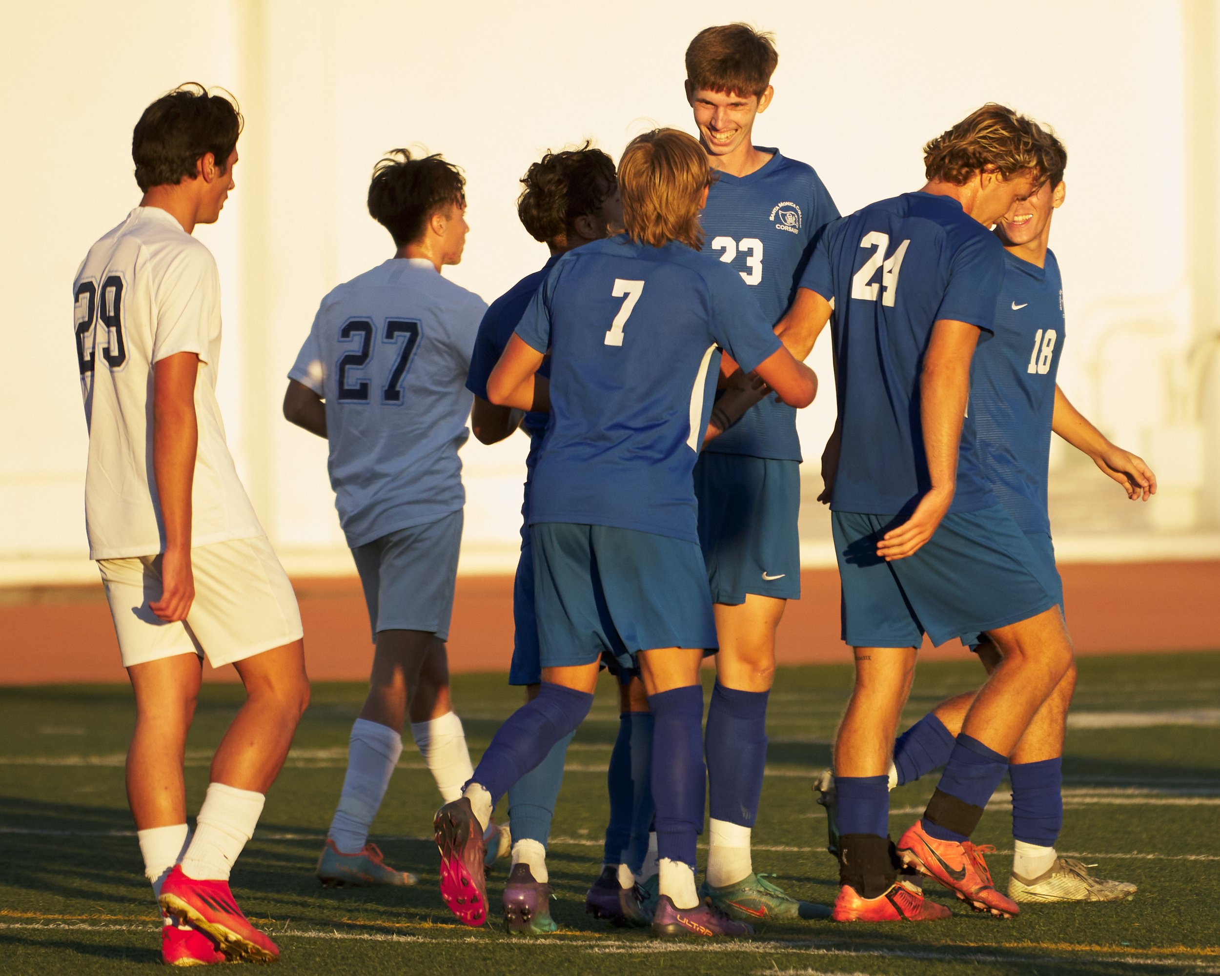  Members of the Santa Monica College Corsairs' Men's Soccer Team share congratulations with Ryan Maher (tallest) during the men's soccer match against the Moorpark College Raiders on Tuesday, Oct. 25, 2022, at Corsair Field in Santa Monica, Calif. Th