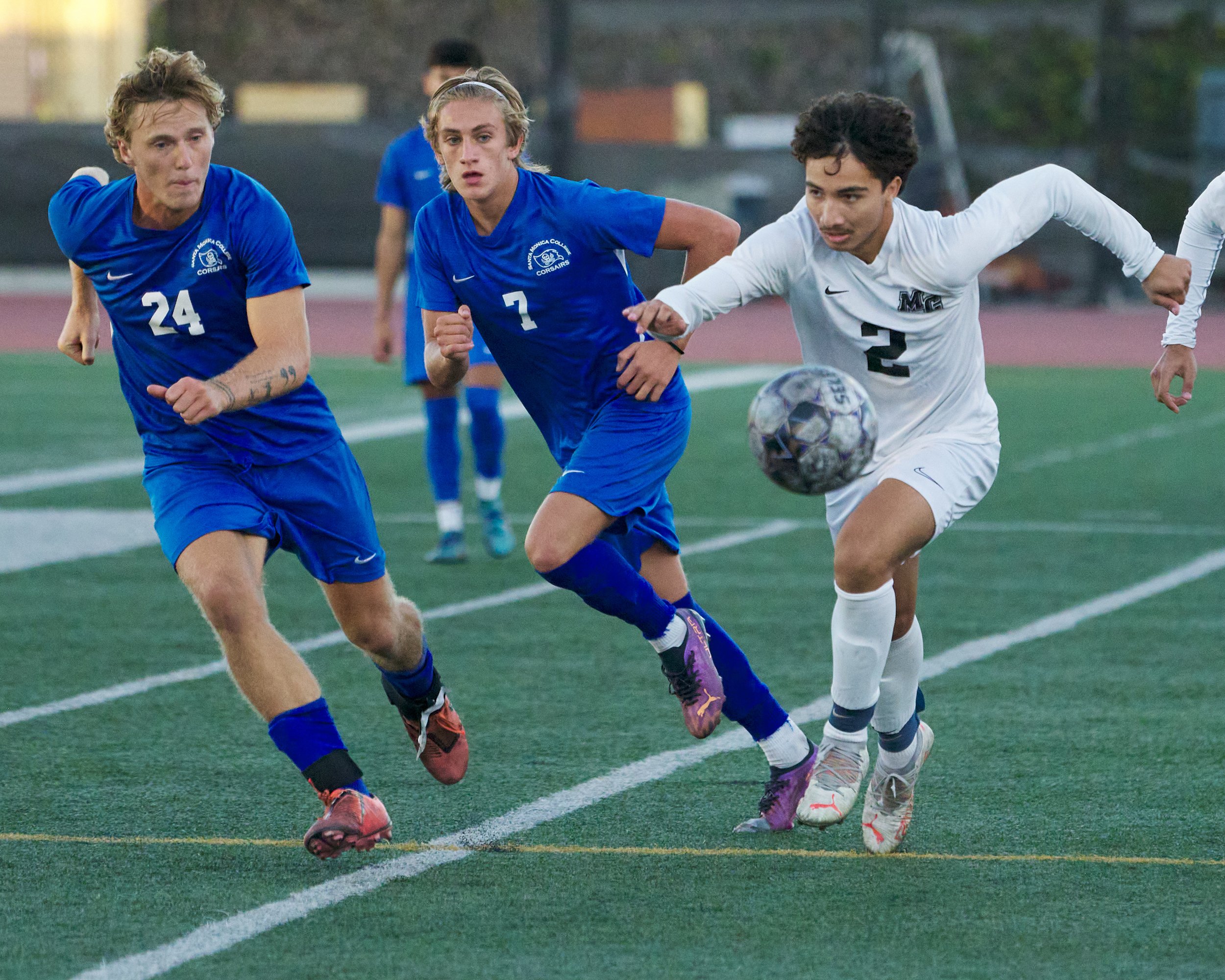  Santa Monica College Corsairs' Alexander Lalor and Darren Lewis, and Moorpark College Raiders' Chris Aguilar during the men's soccer match on Tuesday, Oct. 25, 2022, at Corsair Field in Santa Monica, Calif. The Corsairs won 4-0. (Nicholas McCall | T