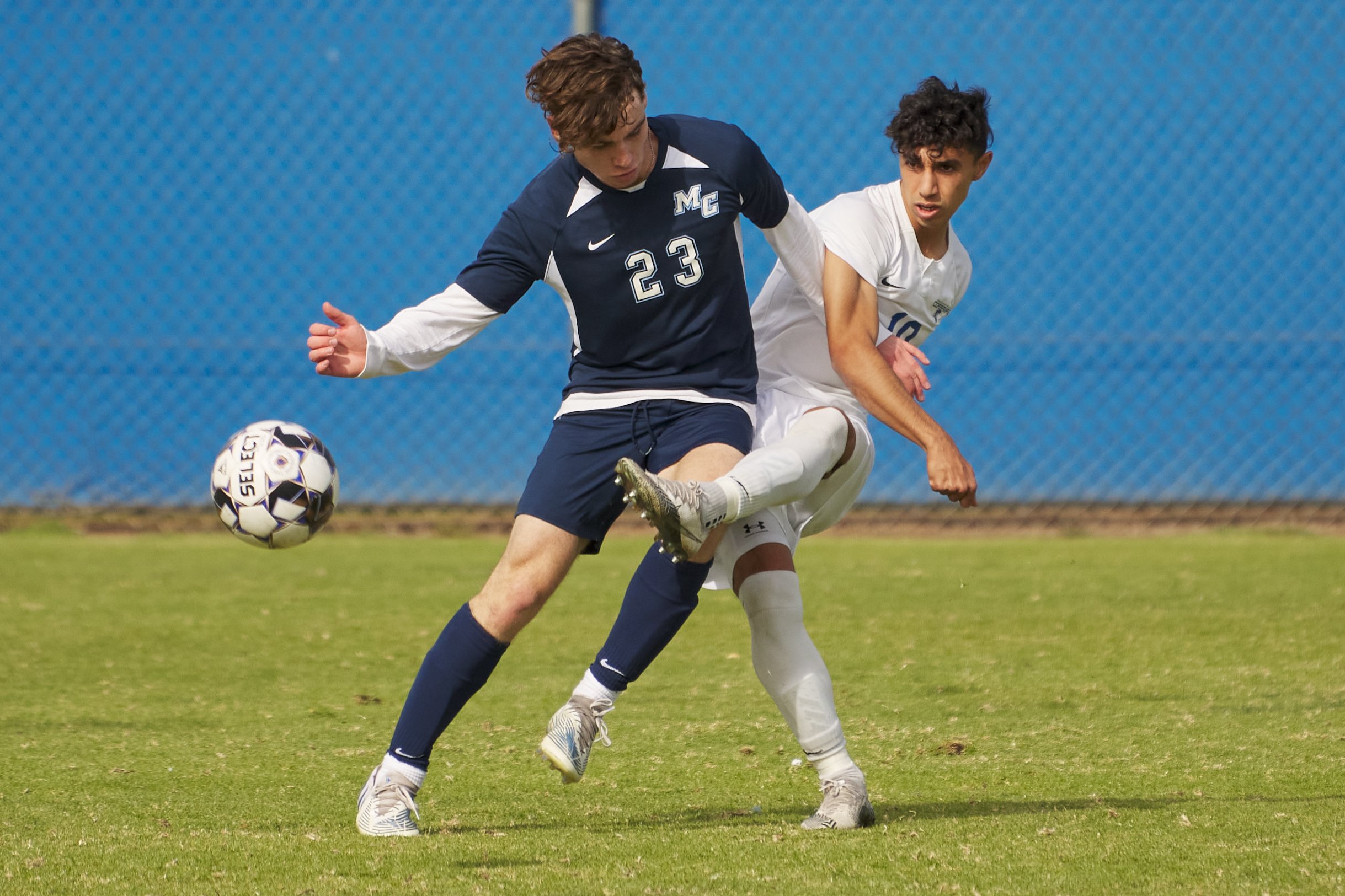  Santa Monica College Corsairs' Roey Kivity (right) kicks the ball past Moorpark College Raiders' Ethan Strief (left) during the men's soccer match on Friday, Nov. 11, 2022, at Field Hockey Stadium in Moorpark, Calif. The Corsairs won 2-1. (Nicholas 