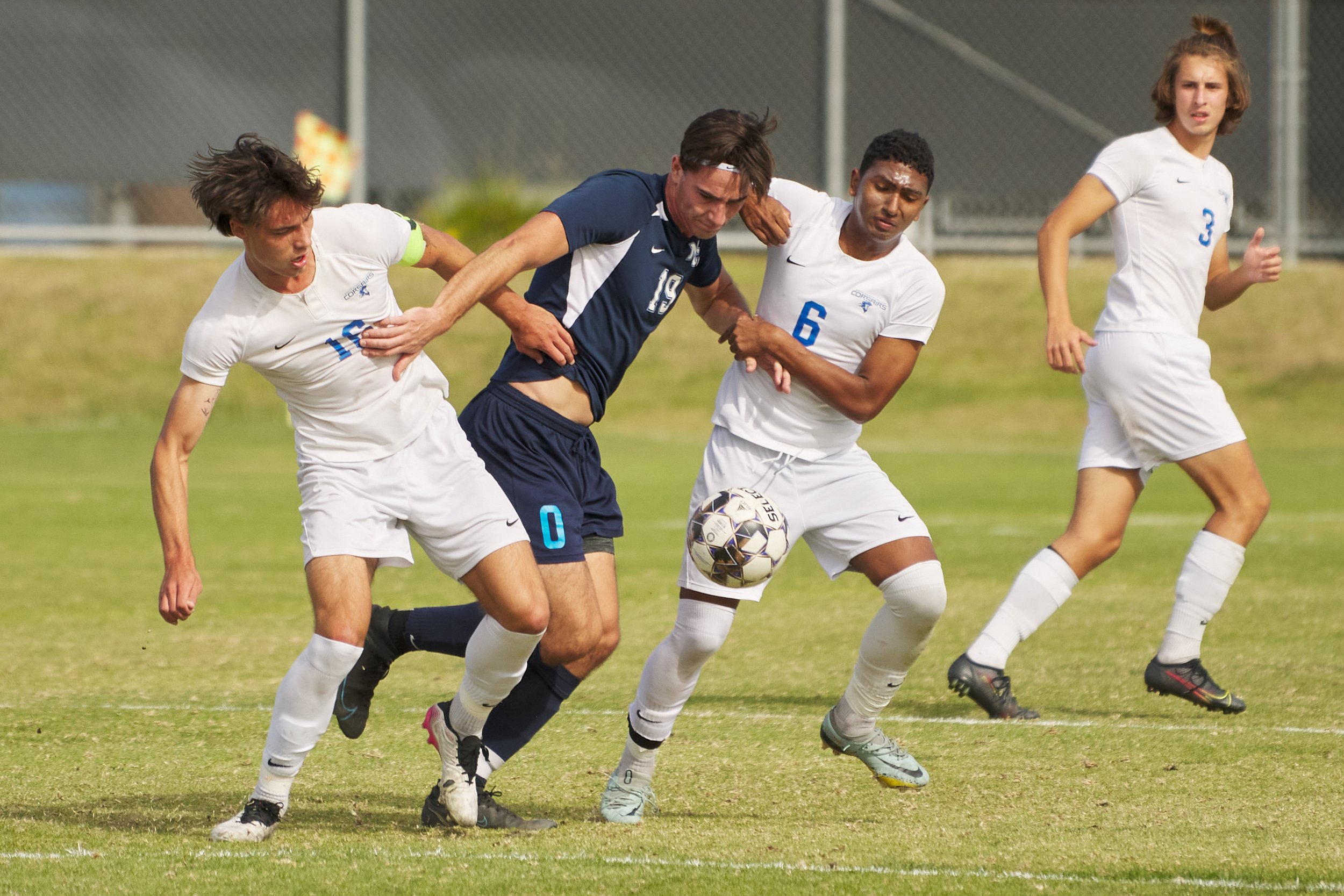  Santa Monica College Corsairs' Kyler Sorber (left), Sebastian Alvarez Luna (6), Axel Green (right), and Moorpark College Raiders' Christian Bower during the men's soccer match on Friday, Nov. 11, 2022, at Field Hockey Stadium in Moorpark, Calif. The