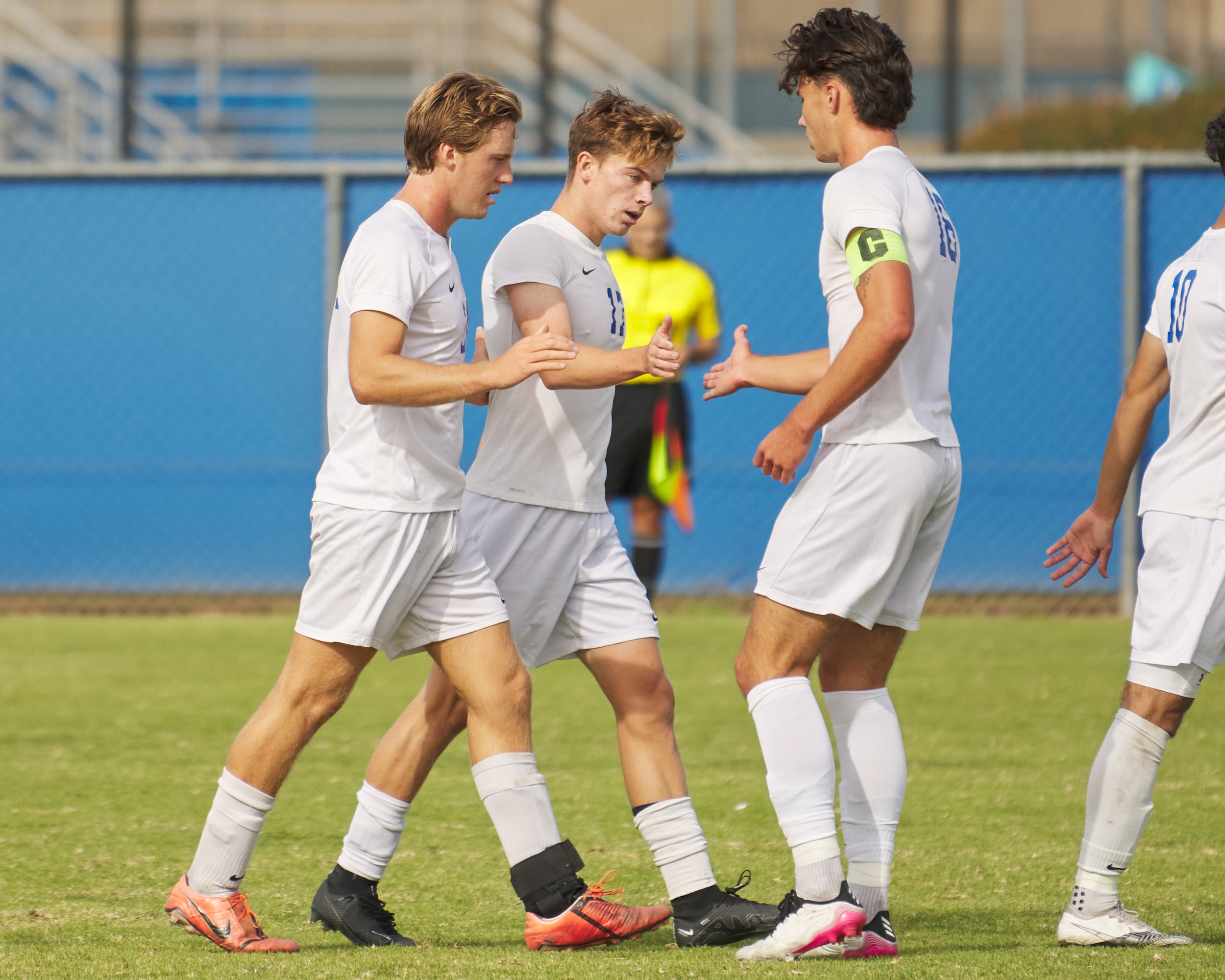  Santa Monica College Corsairs' Alexander Lalor, Taj Winnard, and Kyler Sorber celebrate Winnard's goal against the Moorpark College Raiders during the men's soccer match on Friday, Nov. 11, 2022, at Field Hockey Stadium in Moorpark, Calif. The Corsa