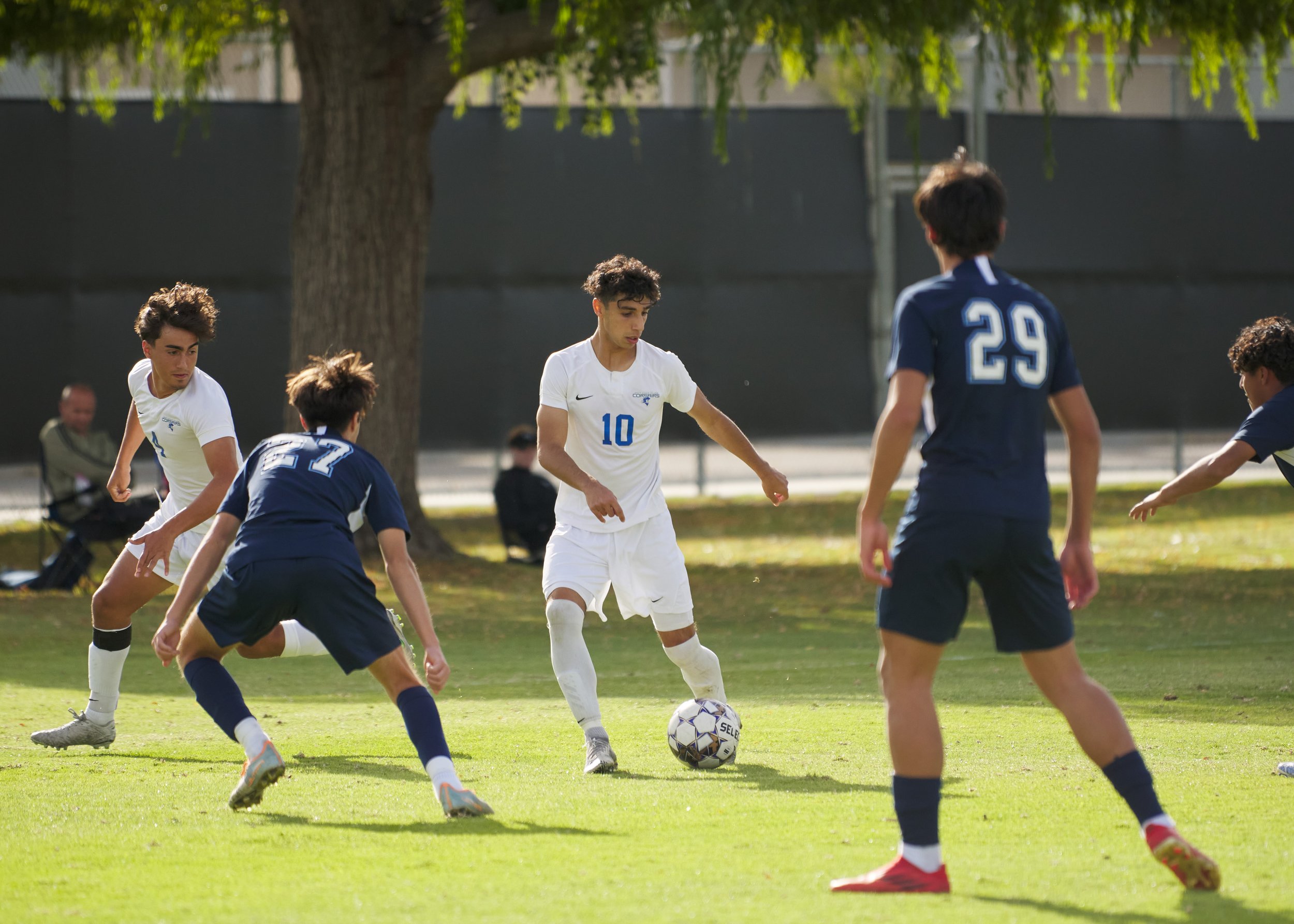  Santa Monica College Corsairs' Jose Arias (left), Roey Kivity (10), and Moorpark College Raiders Cytres Vives (center left) and Jonathan Rivera (29) during the men's soccer match on Friday, Nov. 11, 2022, at Field Hockey Stadium in Moorpark, Calif. 