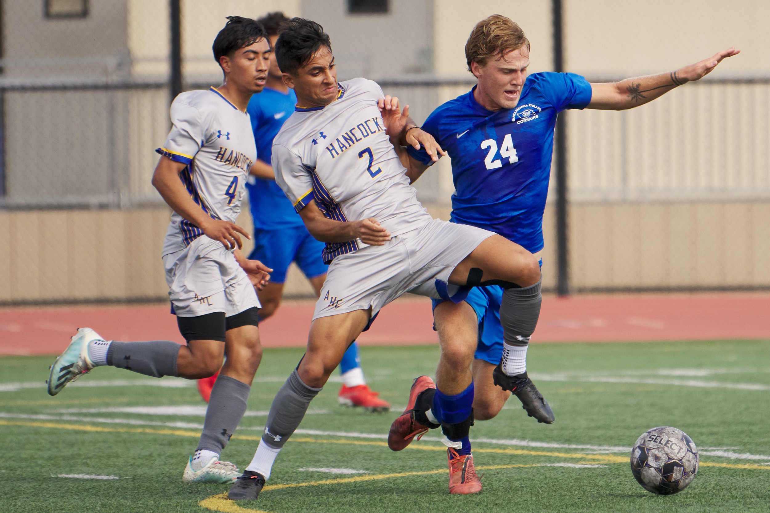  Allan Hancock College Bulldogs' Hector Villa, Eric Diaz, and Santa Monica College Corsairs' Alexander Lalor during the men's soccer match on Tuesday, Nov. 8, 2022, at Corsair Field in Santa Monica, Calif. The Corsairs won 7-1. (Nicholas McCall | The