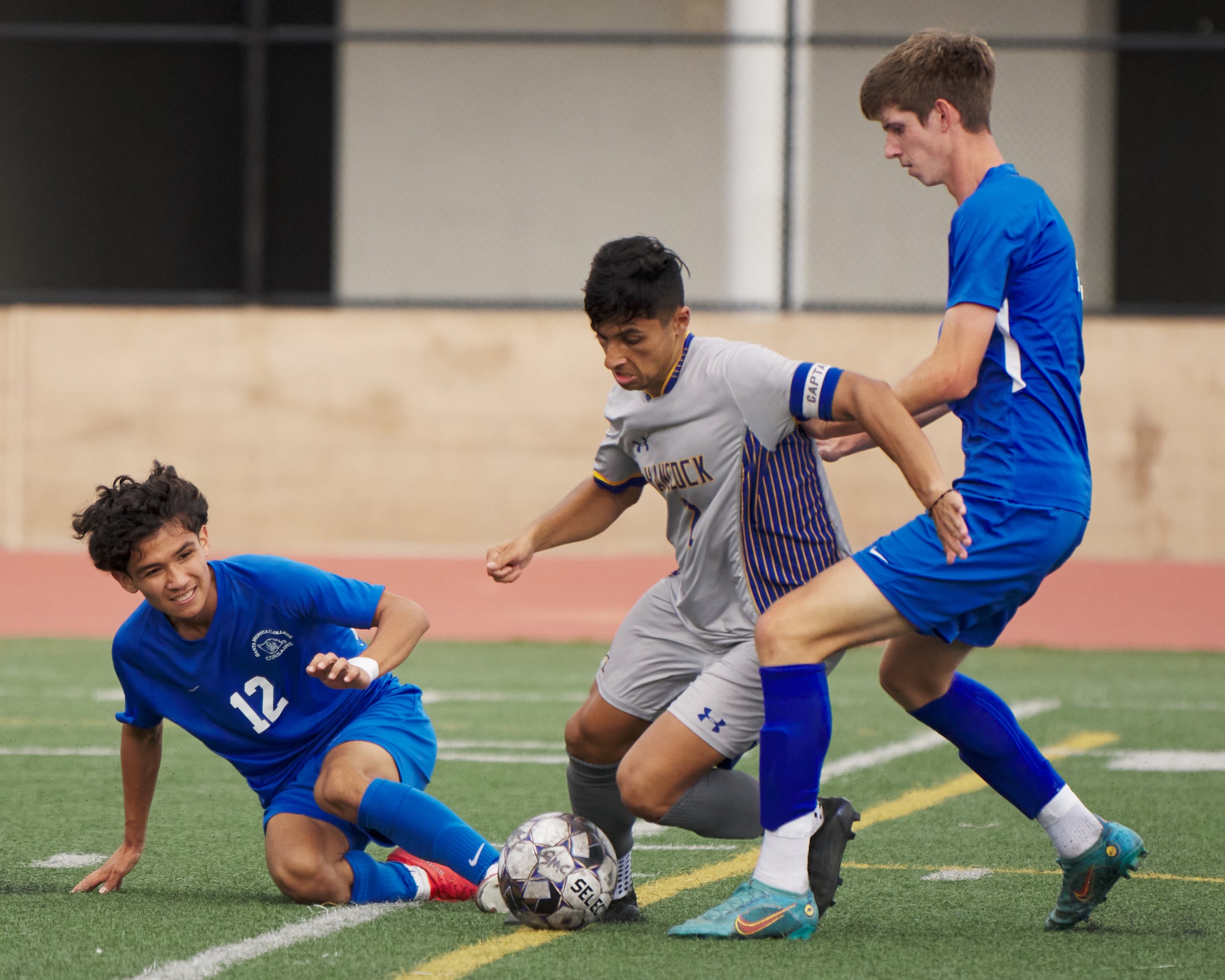  Santa Monica College Corsairs' Jason Moreno (left), Ryan Maher (right), and Allan Hancock College Bulldogs' Eric Diaz (center) during the men's soccer match on Tuesday, Nov. 8, 2022, at Corsair Field in Santa Monica, Calif. The Corsairs won 7-1. (Ni