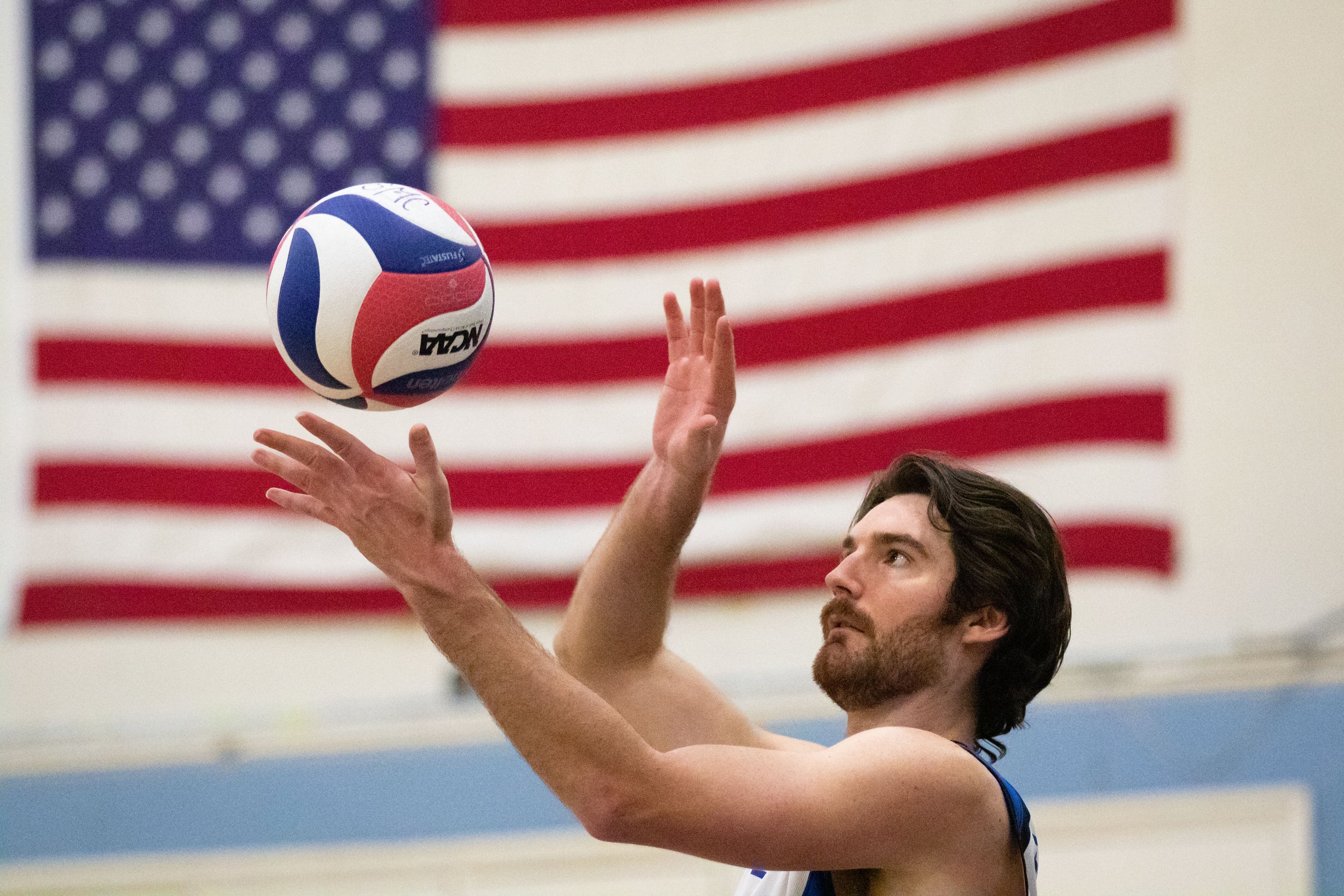  Santa Monica College Corsair Jonathan Pritchard (11, middle blocker) serving the ball in the second set in a home game against San Diego Mesa College in Santa Monica, Calif., on Wednesday, Feb. 15, 2023. The game ended with the Corsair's defeat: 3 -