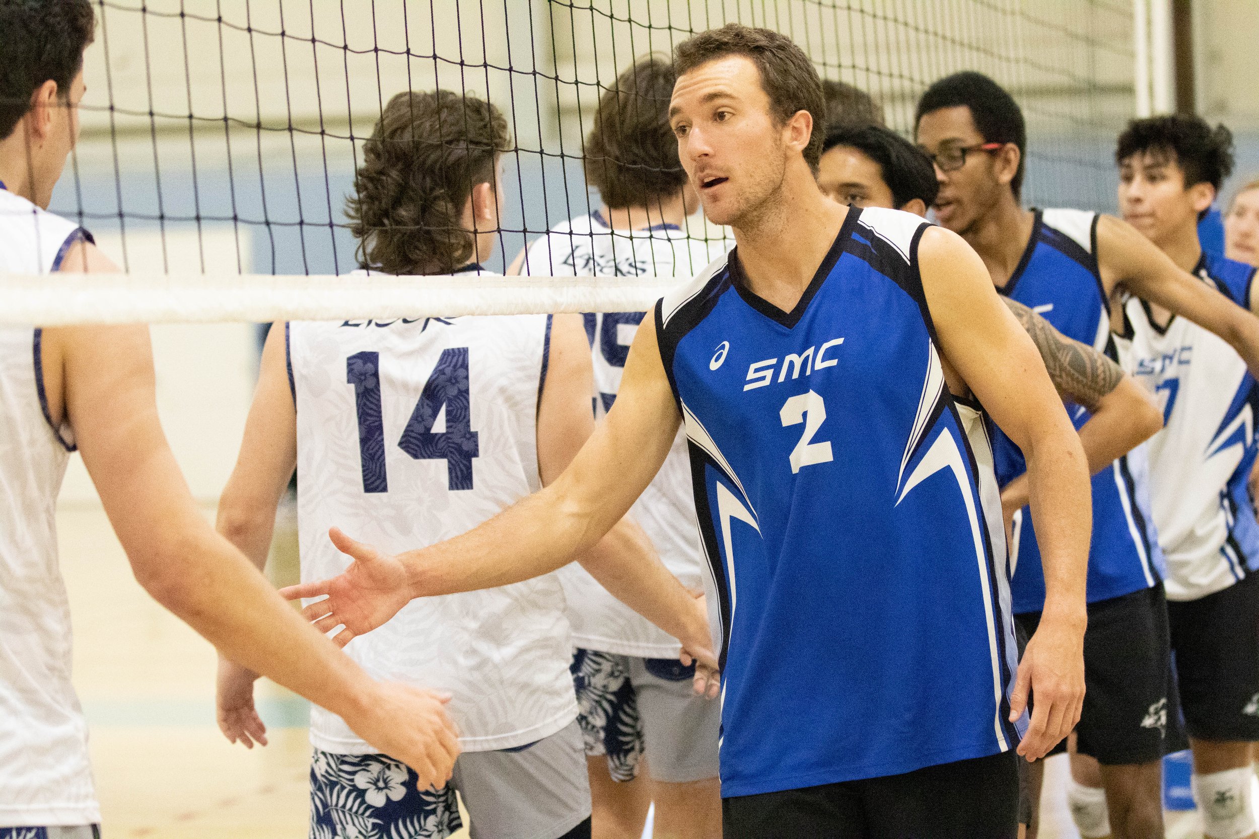  Santa Monica College Corsair outside hitter Kane Schwengel (2) 'shakes hands' after a home game against Irvine Valley College Lasers in Santa Monica, Calif., on Friday, Feb. 24, 2023. The match ended with the Corsairs' defeat: 3 - 1. (Caylo Seals |T