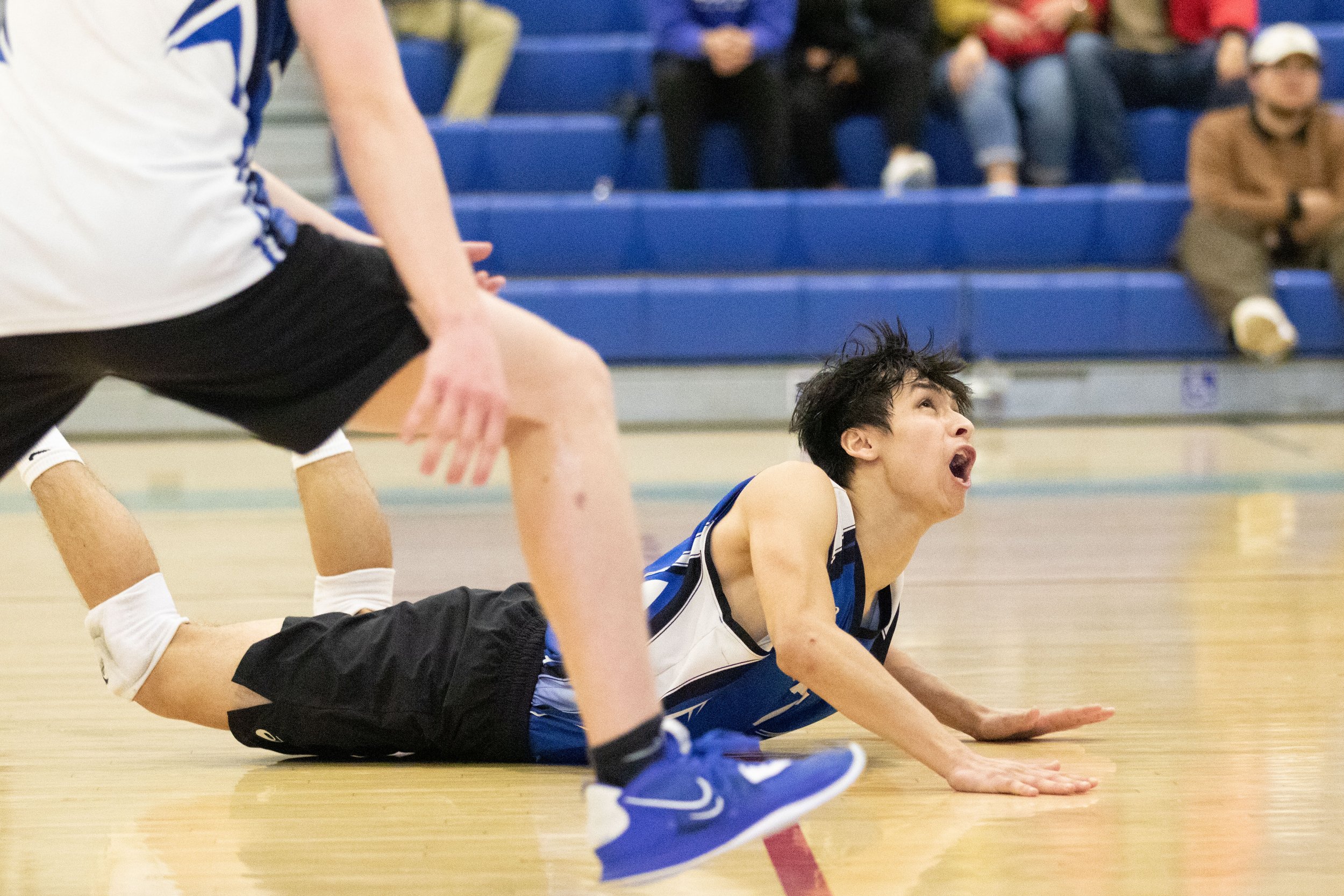  Santa Monica College Corsair libero Javier Castillo (7) after diving for the ball to prevent a kill by Long Beach City College Vikings during the second set of a home game in Santa Monica, Calif., on Friday, March 3, 2023. The game resulted in the C