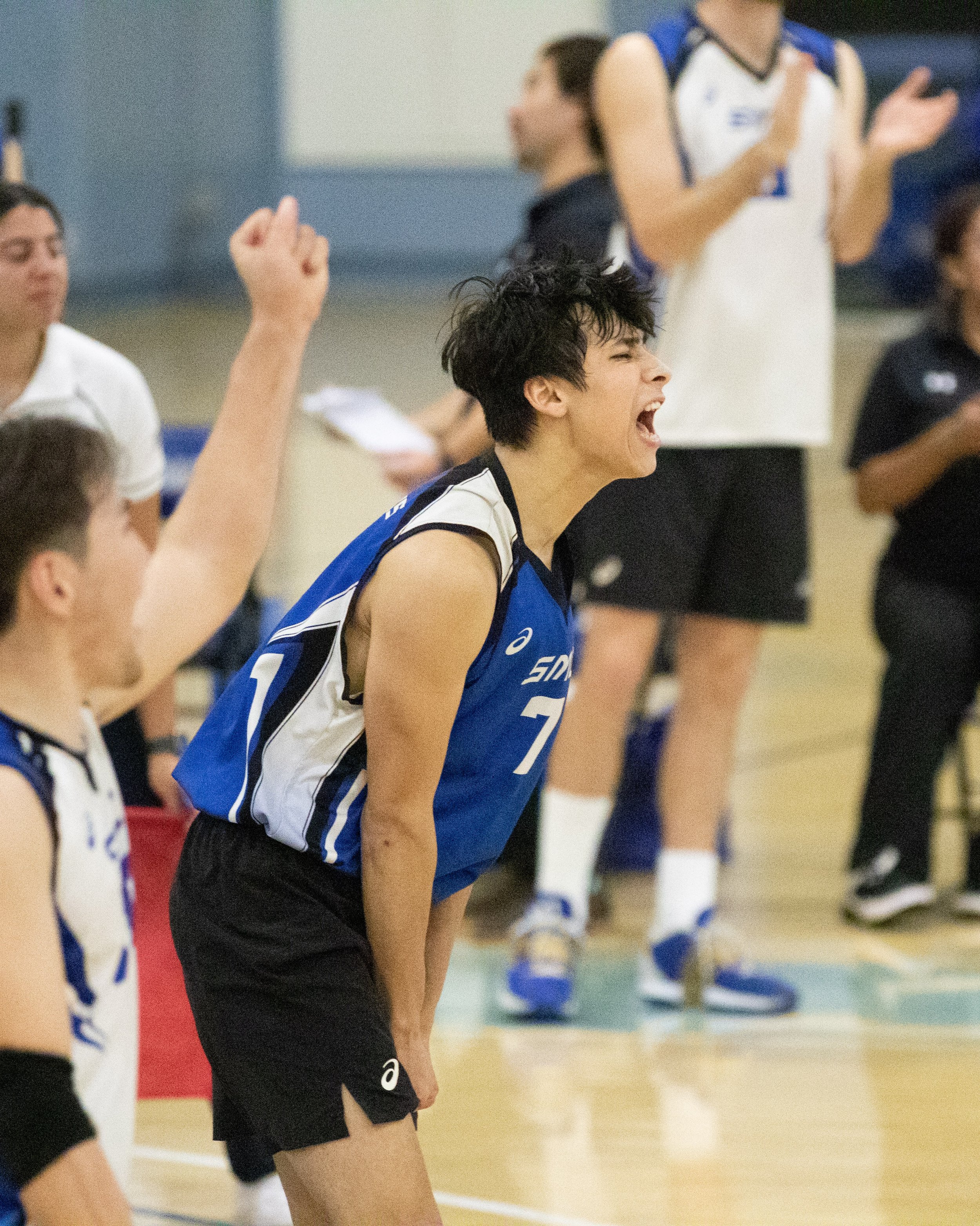  Santa Monica College Corsair libero Javier Castillo (7) cheering after the Corsairs scored during the third set of a home game against Long Beach City College Vikings in Santa Monica, Calif., on Friday, March 3, 2023. The game resulted in the Corsai