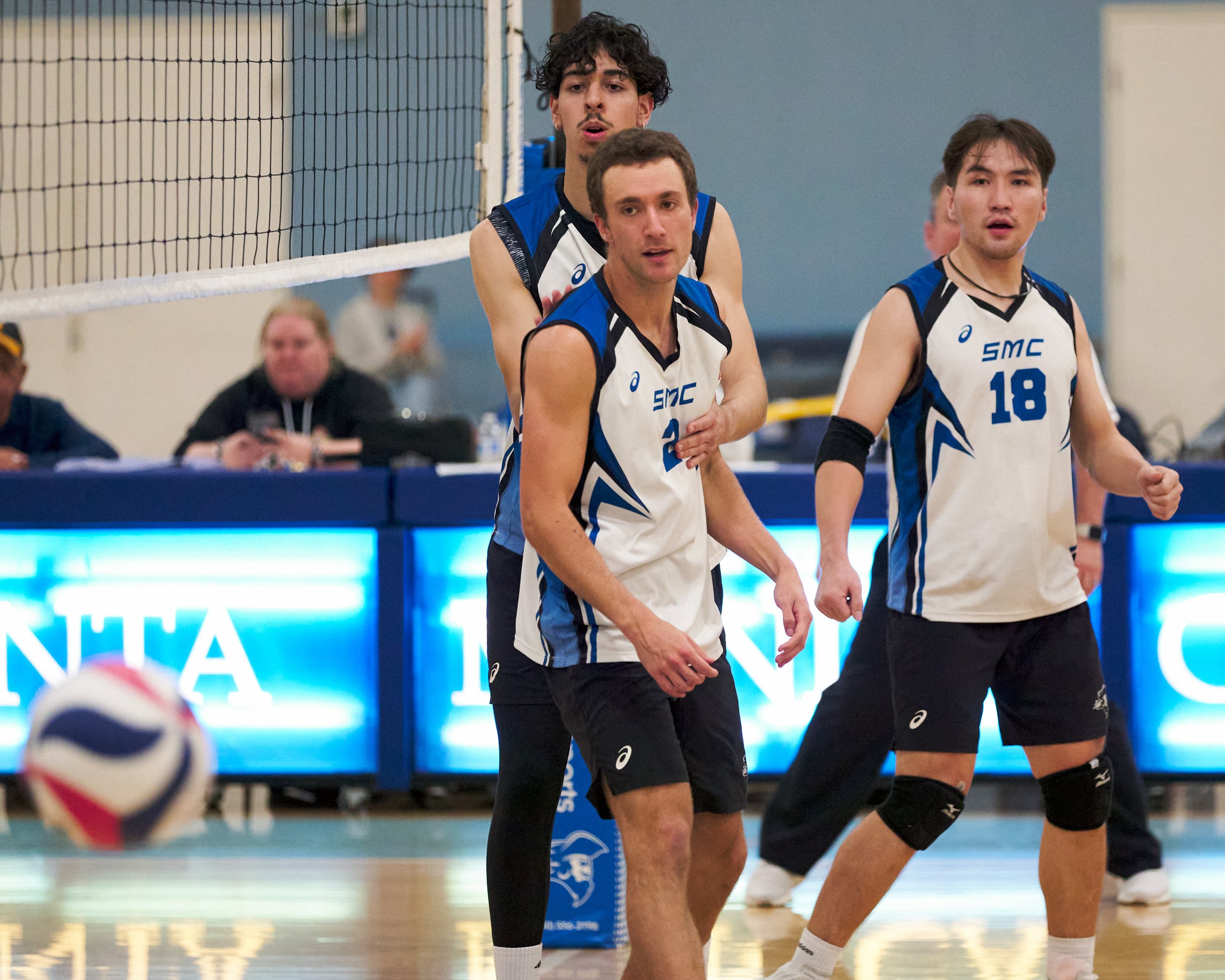 Santa Monica College Corsairs' Kane Schwengel (center), Luis Garzon (left), and Enkhtur Tserendavaa (right) watch the ball hit the ground during the men's volleyball match against the Long Beach City College Vikings on Friday, March 4, 2023, at Cors