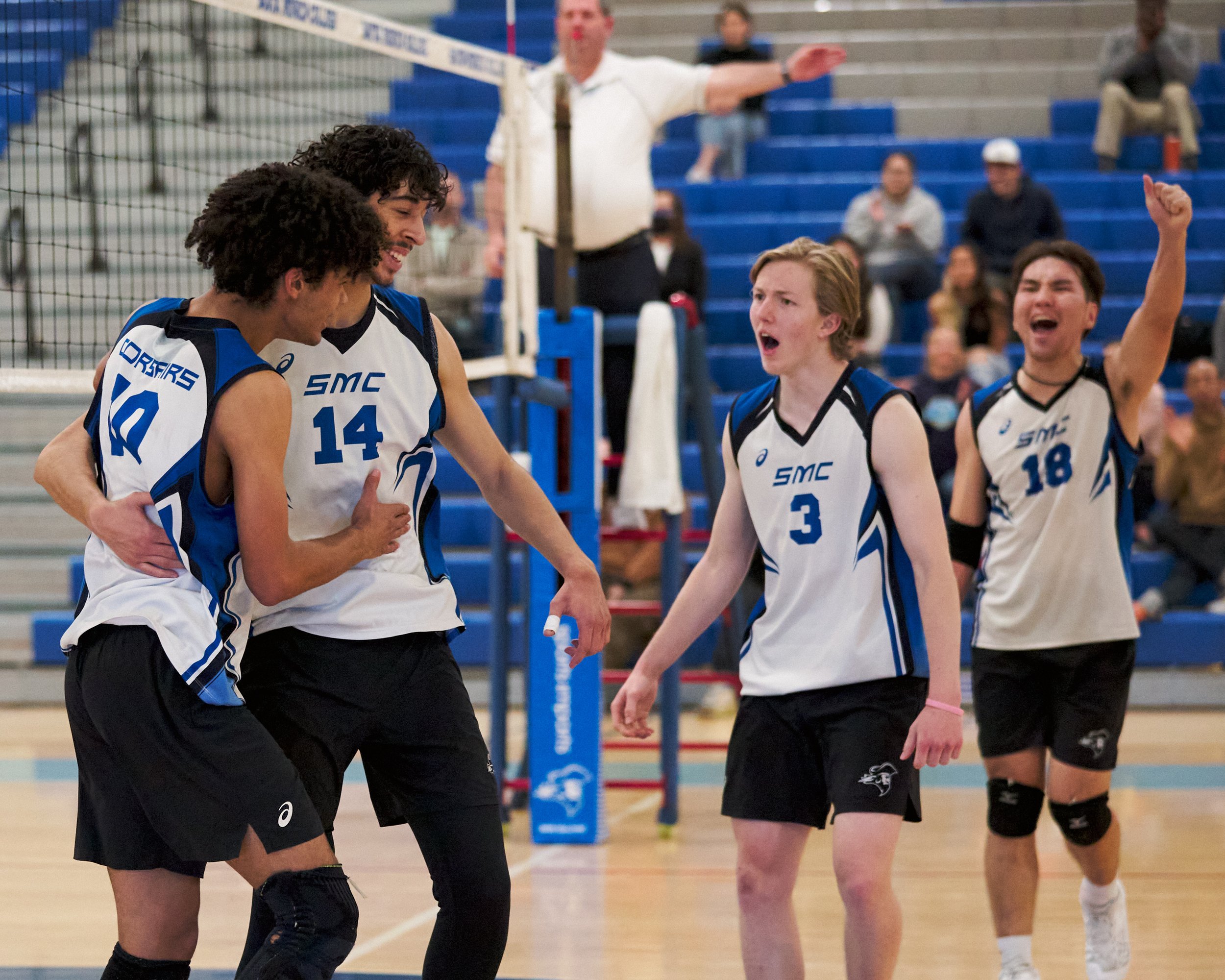  Santa Monica College Corsairs' Nate Davis, Luis Garzon, Camden Higbee, and Enkhtur Tserendavaa celebrate scoring a point during the men's volleyball match against the Long Beach City College Vikings on Friday, March 4, 2023, at Corsair Gym in Santa 