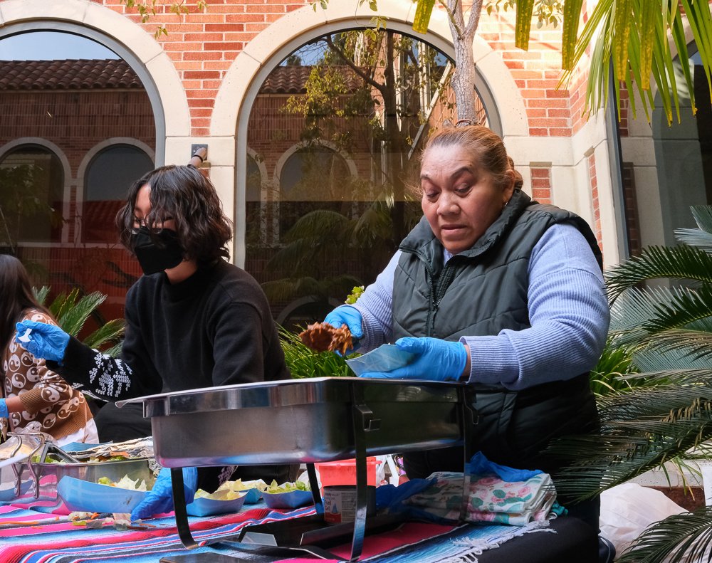  Elsa Chan prepping the next dish of their handmade mole to hand out to the quest.Fowler Museum ,UCLA, Calif, MAR,4, 2023(The Corsair |AleJandro Contreras) 