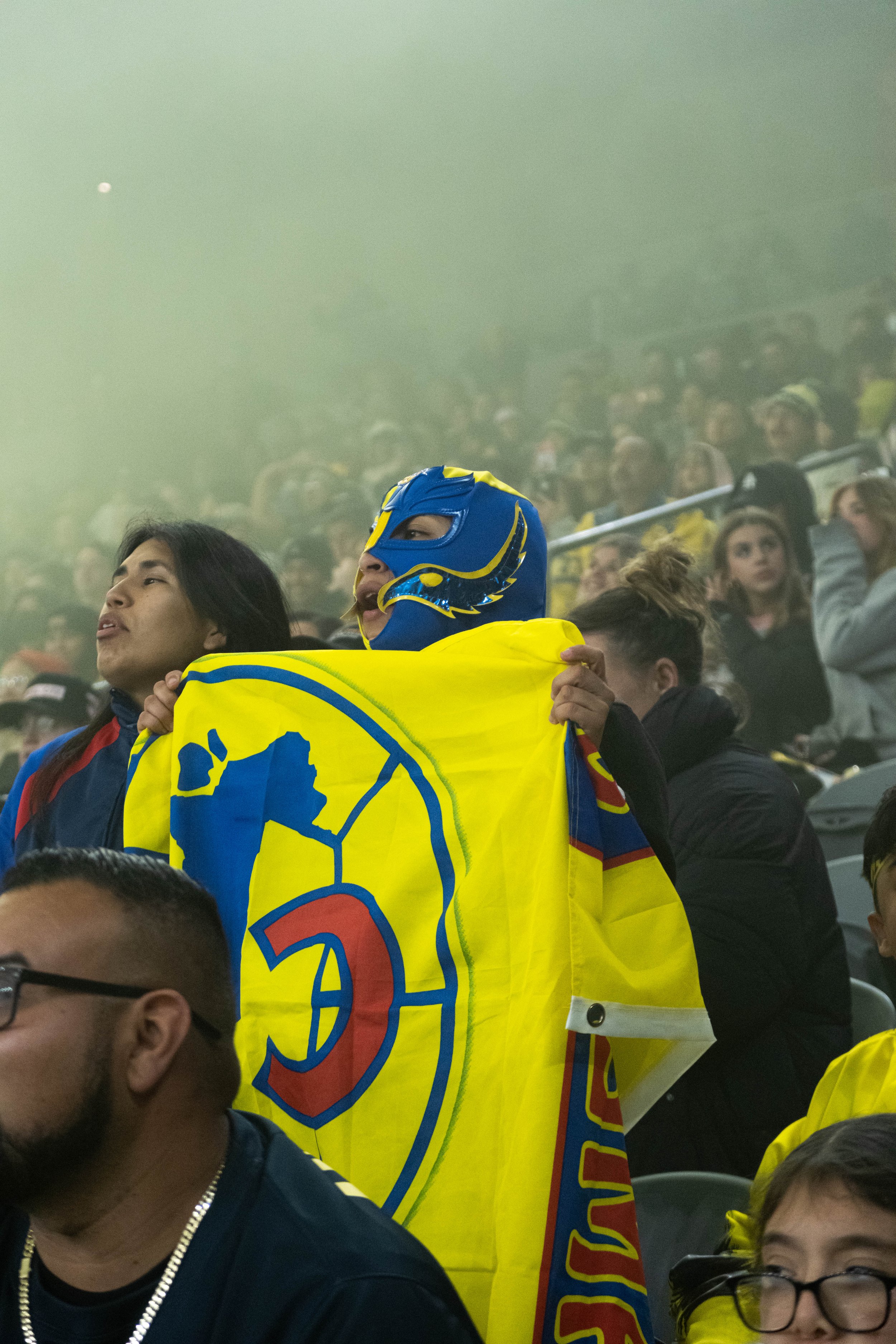  Club America Femenil fan wearing a luhador(fighter) mask with the clubs colors during their international friendly against Angel City Football Club on Wed. March 8, 2023 at BMO Stadium in Los Angeles, Calif. (Danilo Perez | The Corsair) 