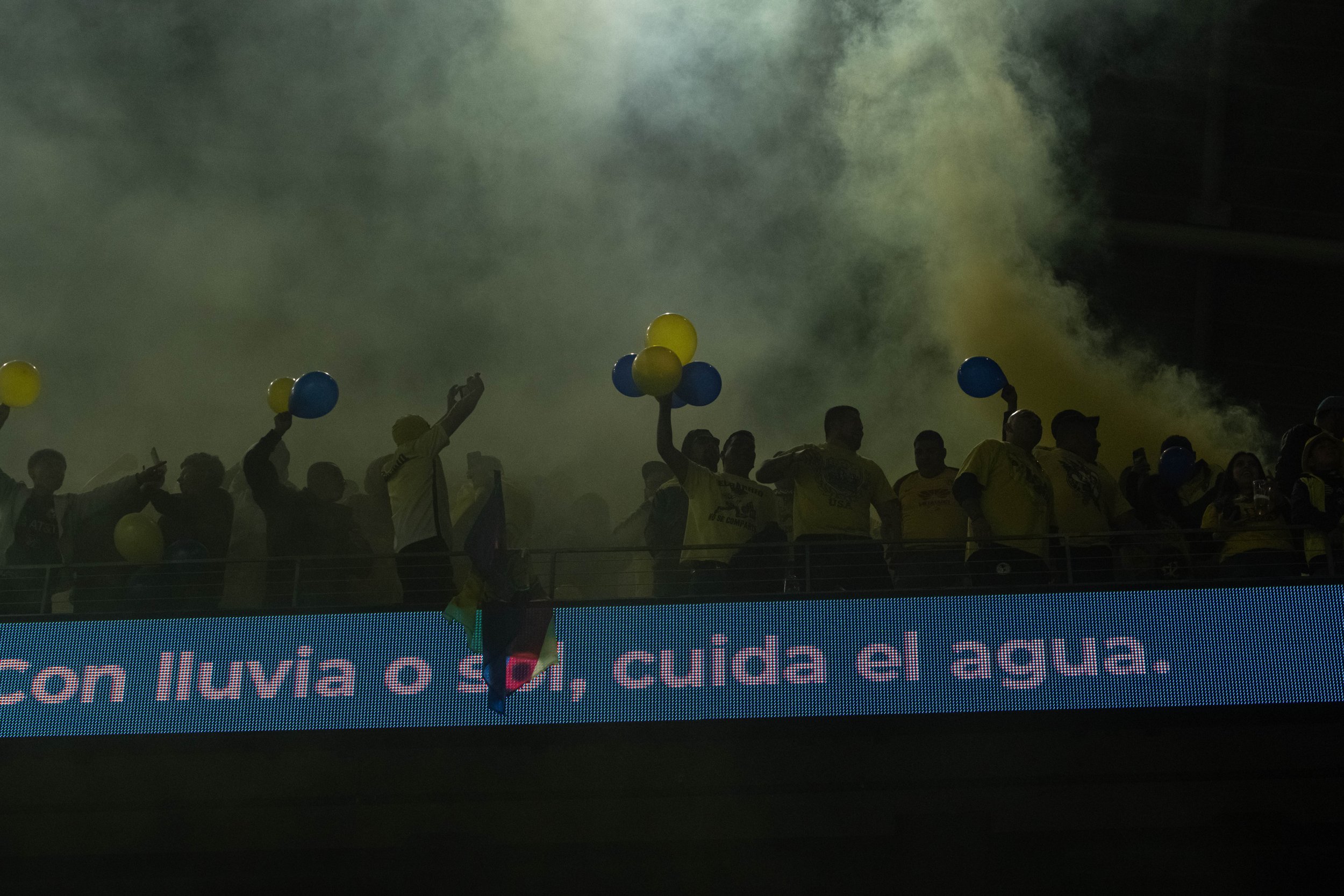  Club America Femenil fans within the yellow smoke they realeased during the international freindly against the home team Angel City FC on Wed. March 8, 2023 at BMO Stadium in Los Angeles, Calif. (Danilo Perez | The Corsair) 