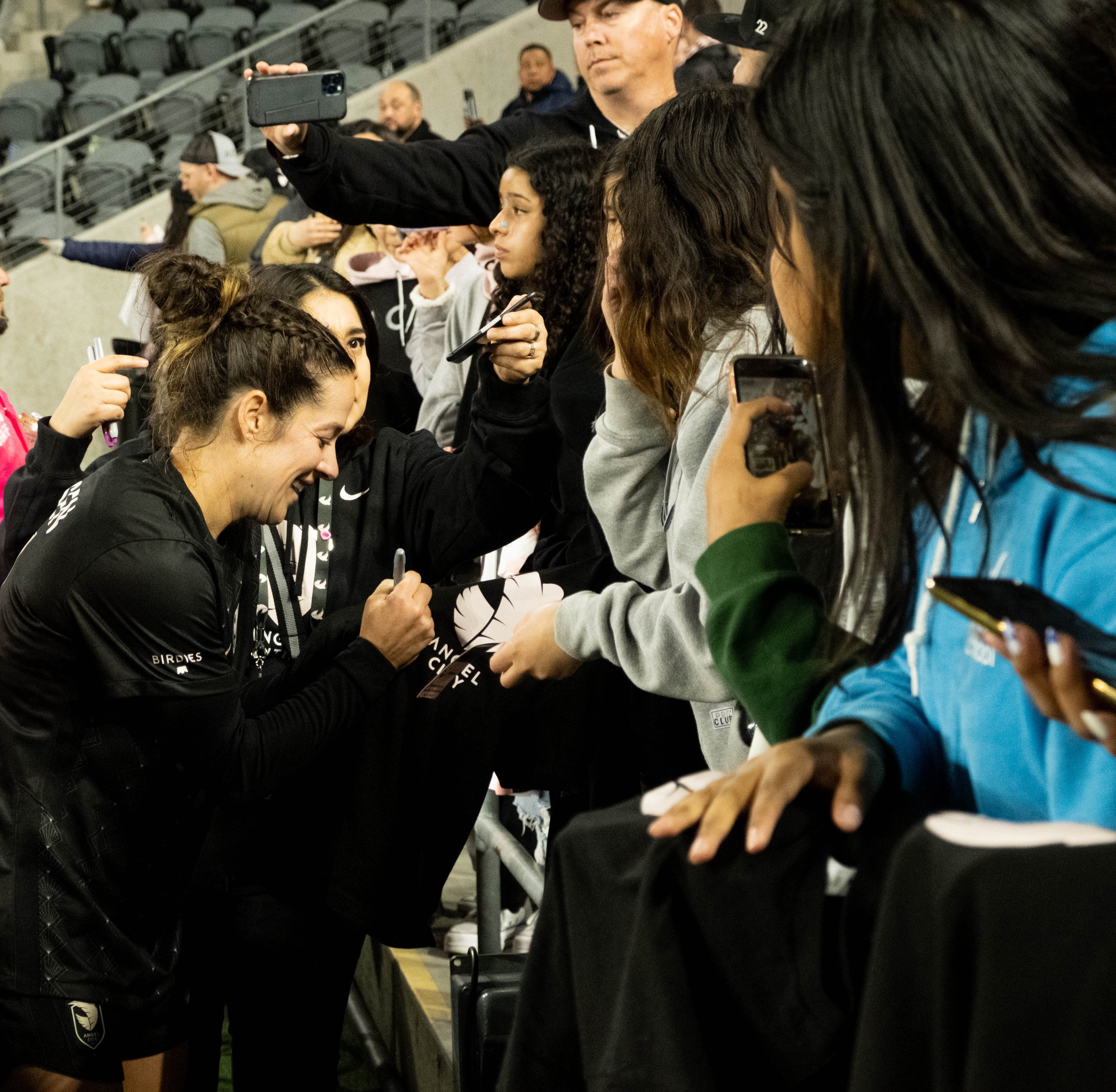  Peige Nielsen from Angel City FC signing autographs at the end of the international friendly against Club America Femenil on Wed. March 8, 2023 at BMO Stadium in Los Angeles 
