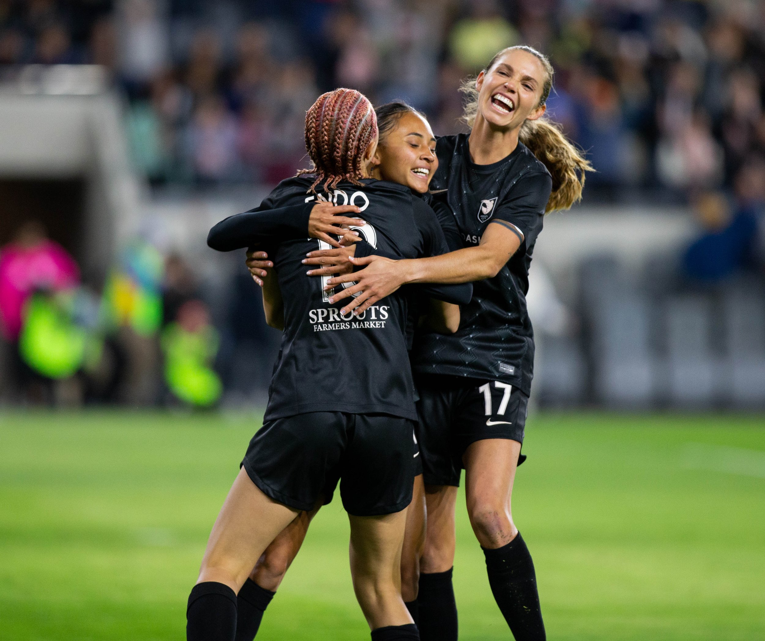  Angel City Fc players Jun Endo(18), Dani Weatherholt(17) celebrating with Alyssa Thompson(21) after scoring her first career goal in the begining of the match during their international friendly against Club America Femenil on Wed. March 8, 2023 at 