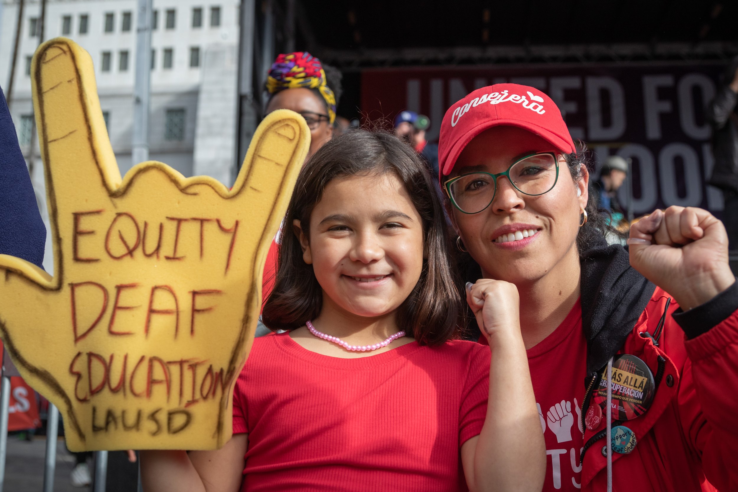  Kristalyn Ibarra, 9, and Janette Duran, a school counselor for Marlton School for the Deaf, at a joint rally with United Teachers Los Angeles (UTLA) and Service Workers International Union (SEIU) Local 99 outside Los Angeles City Hall, Los Angeles, 