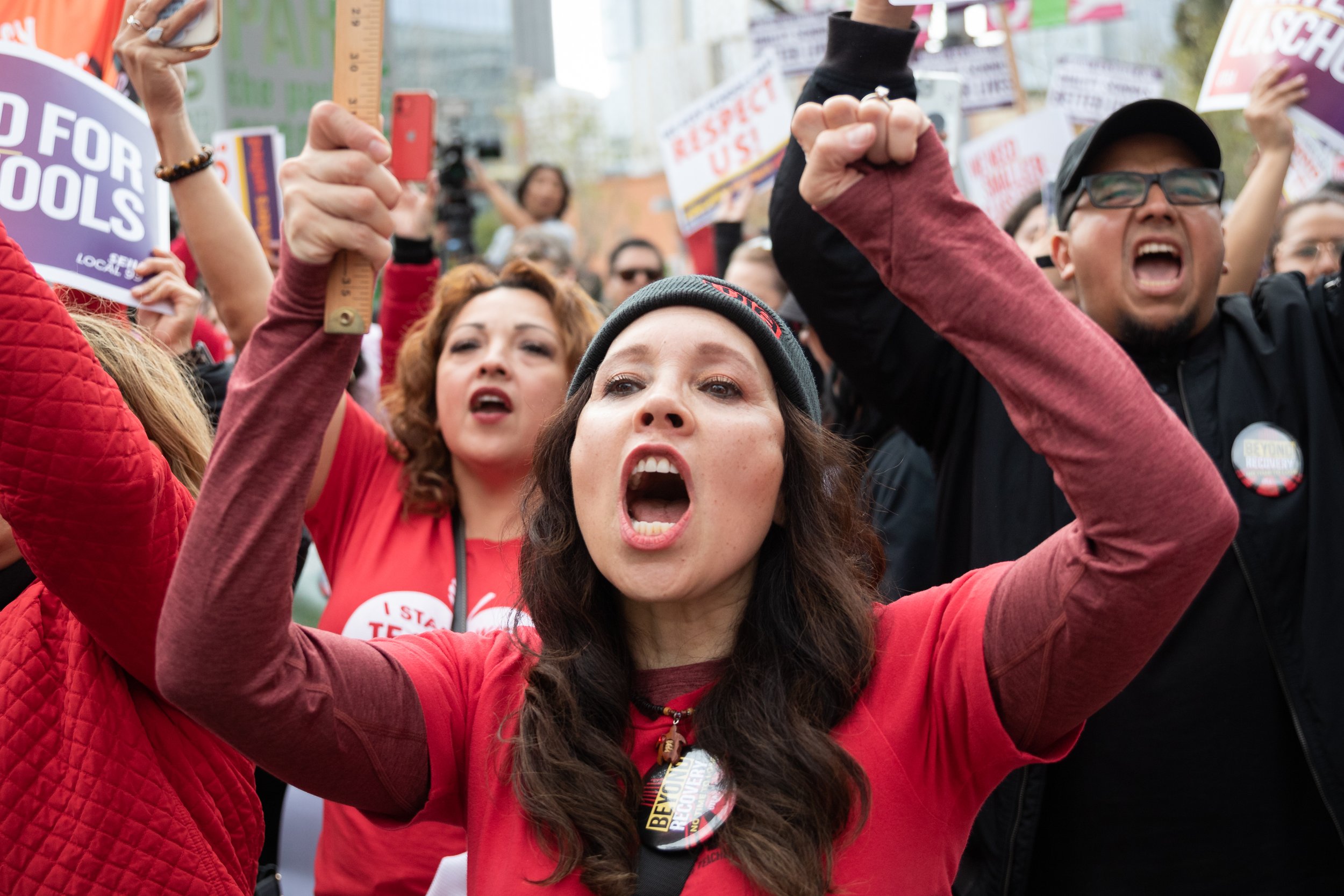  A protester cheering at a rally held by United Teachers Los Angeles (UTLA) and Service Workers International Union (SEIU) Local 99 outside Los Angeles City Hall, Los Angeles, Calif., on Wednesday, March 15, 2023. The rally announced the dates teache