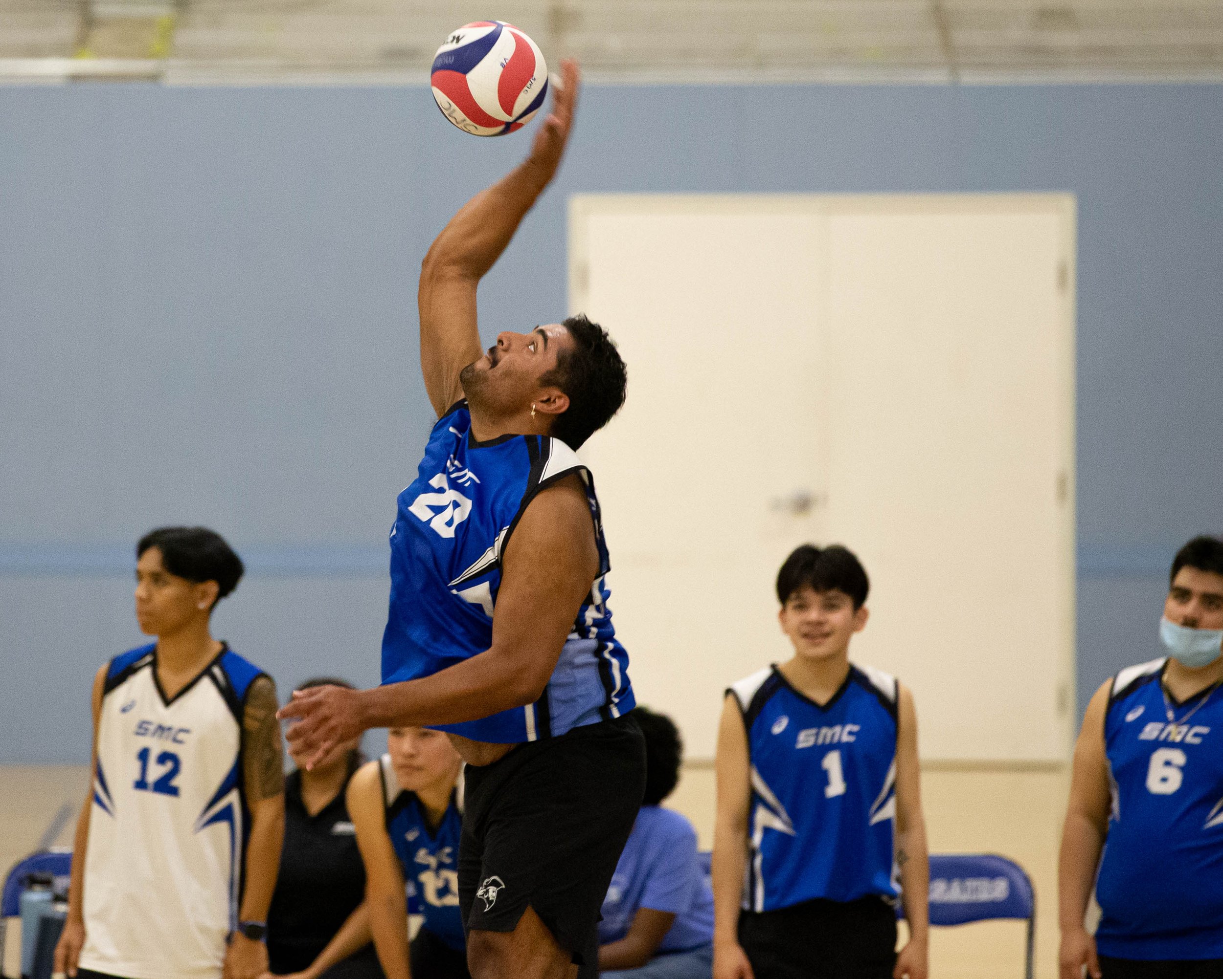  Sergio Carrera(20) from Santa Monica College serving the ball during the Corsairs match against L.A. Pierce College on Wed. March 15, 2023 in the SMC Pavillion at Santa Monica, Calif. (Danilo Perez | The Corsair) 