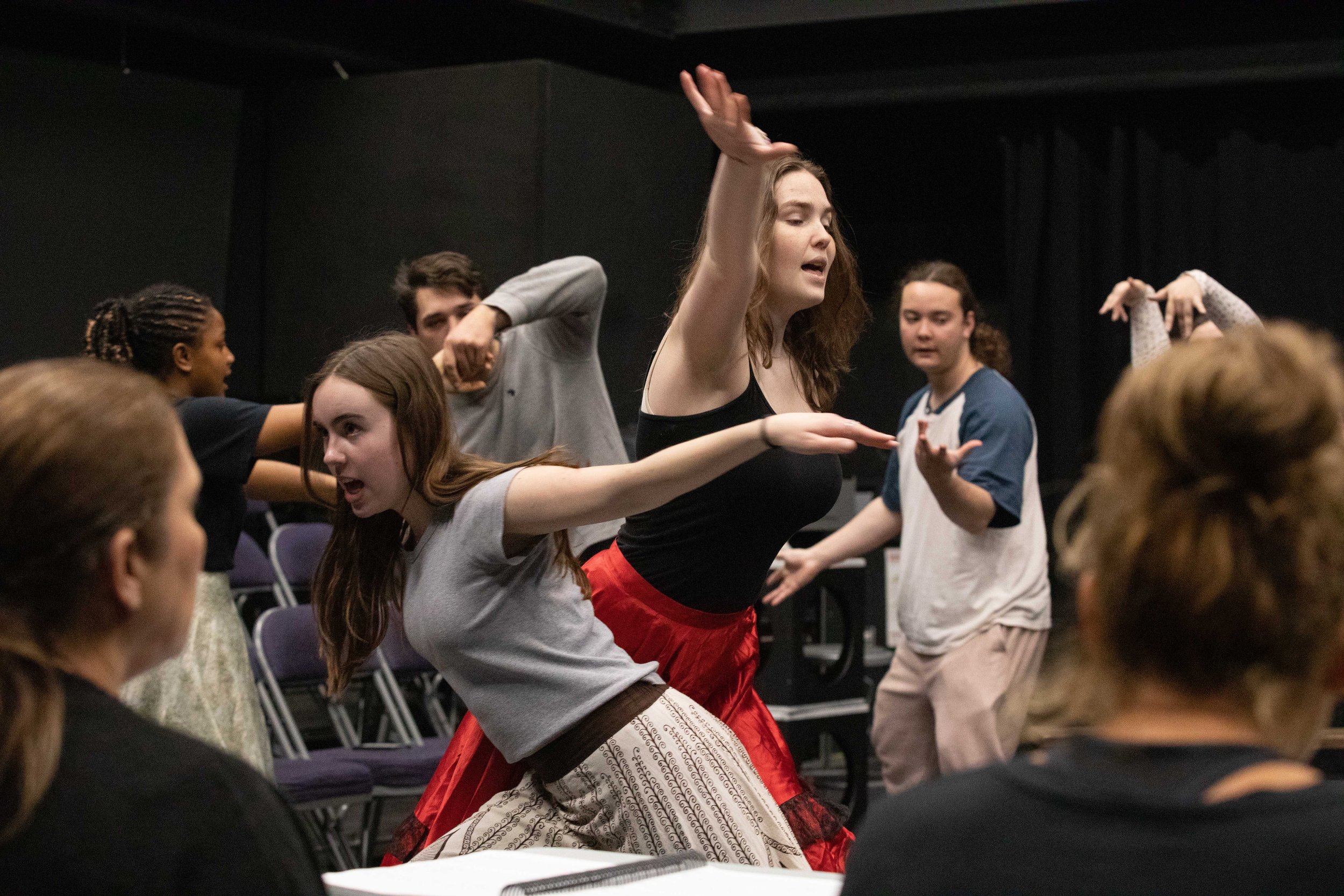  SMC theater students performing at a class rehearsal for the musical “Hunchback of Notredame”. In the foreground, Instructor Perviz Sawoski (Left) and Roma/Gitano Choreographer Cihtli Ocampo  (right). Theater Arts building at SMC main campus, Santa 