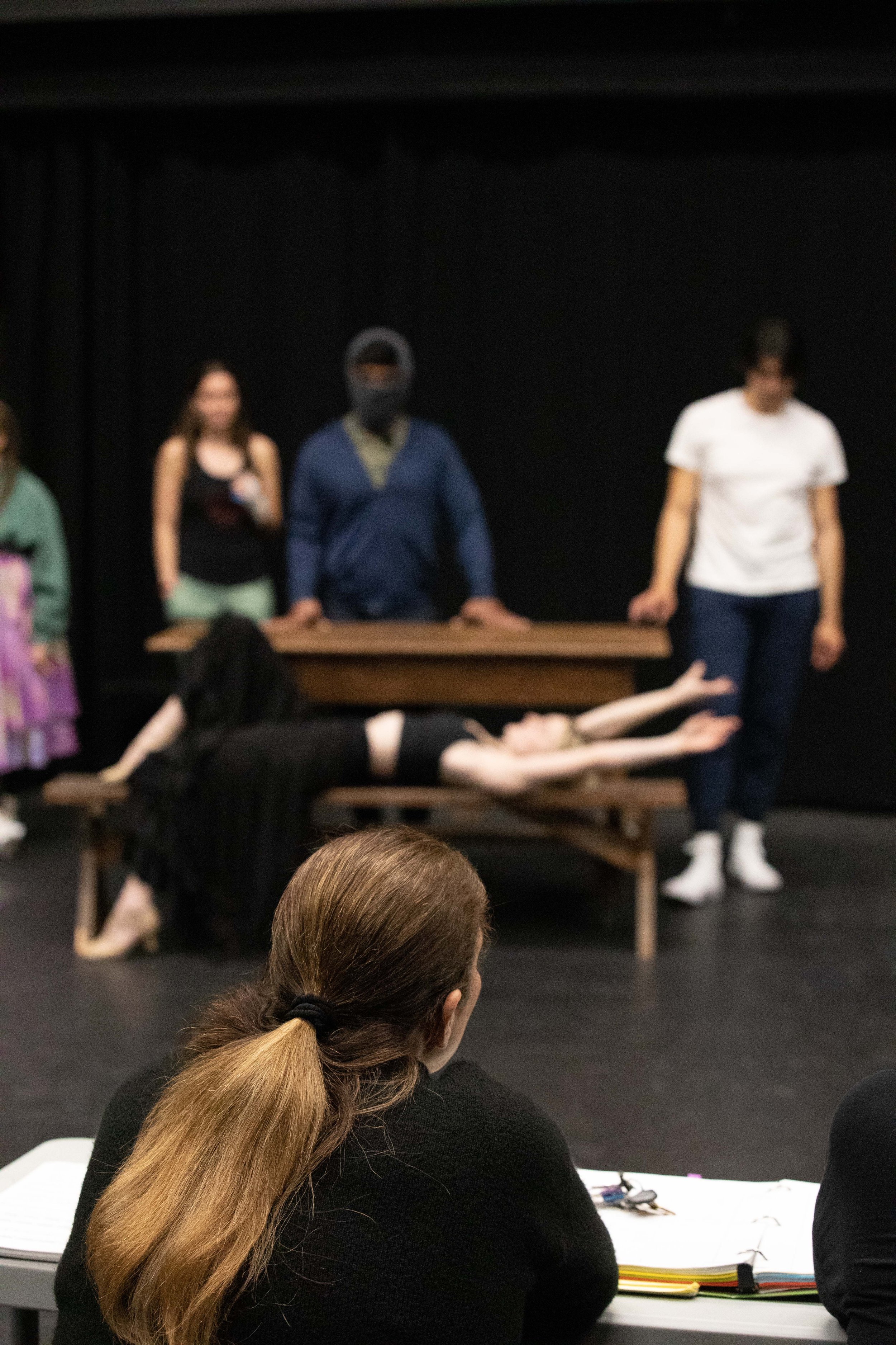  SMC theater students listening to instructions while Teacher Perviz Sawoski (foreground) speaks at a class rehearsal for the musical “Hunchback of Notredame”. Theater Arts building at SMC main campus, Santa Monica, Calif. March Tuesday 7, 2023. (Jor