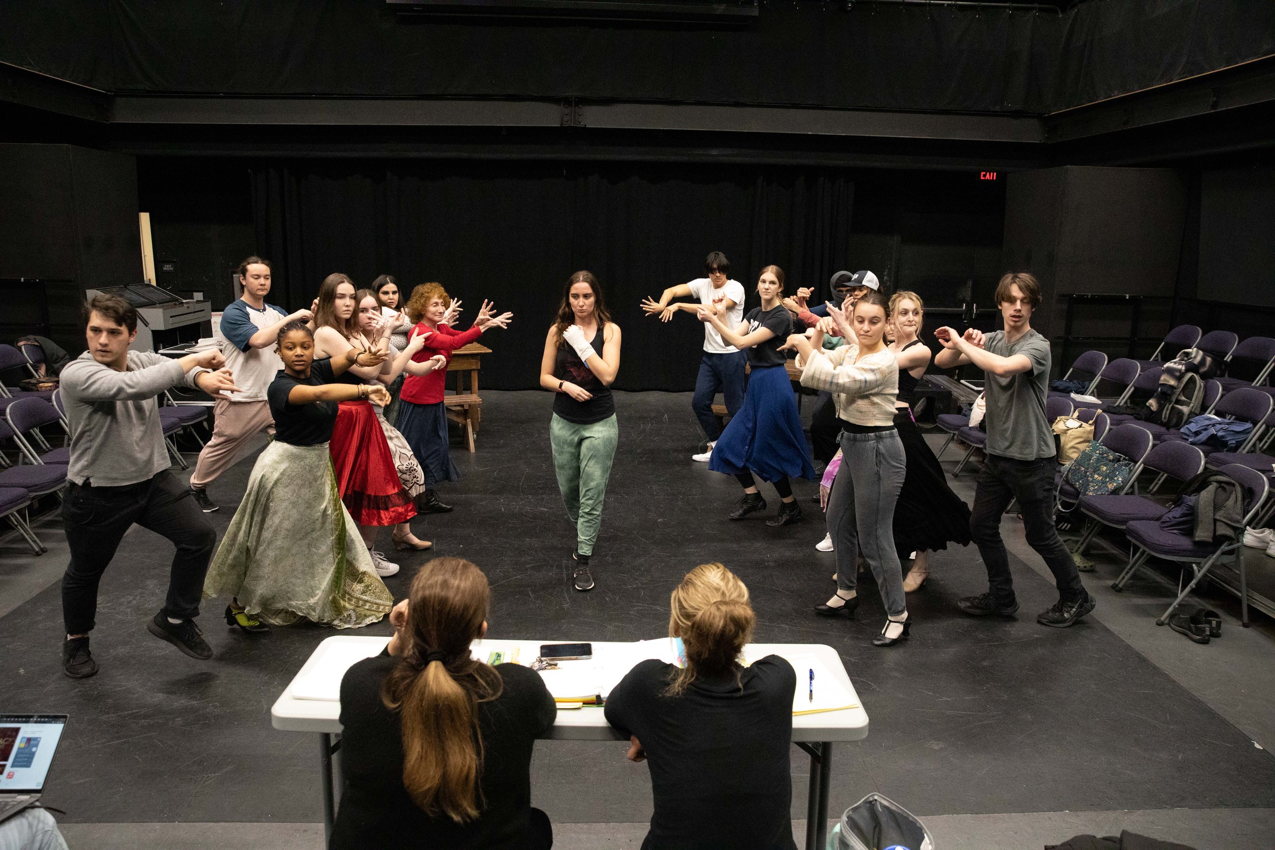  SMC student Talya Sindel (center) performing along her classmates in front of Instructors Perviz Sawoski (left) and Cihtli Ocampo (right) at a class rehearsal for the musical “Hunchback of Notredame”. She plays the role of Esmeralda in the play. The