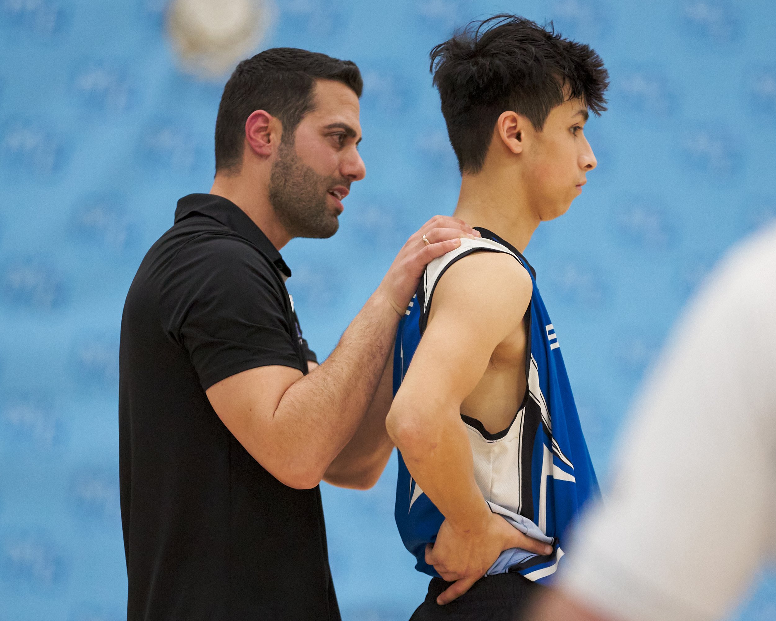  Santa Monica College Corsairs Men's Volleyball Head Coach Liran Zamir rubs Javier Castillo's shoulders during the men's volleyball match against the Moorpark College Raiders on Friday, March 17, 2023, at Moorpark College's Gymnasium in Moorpark, Cal