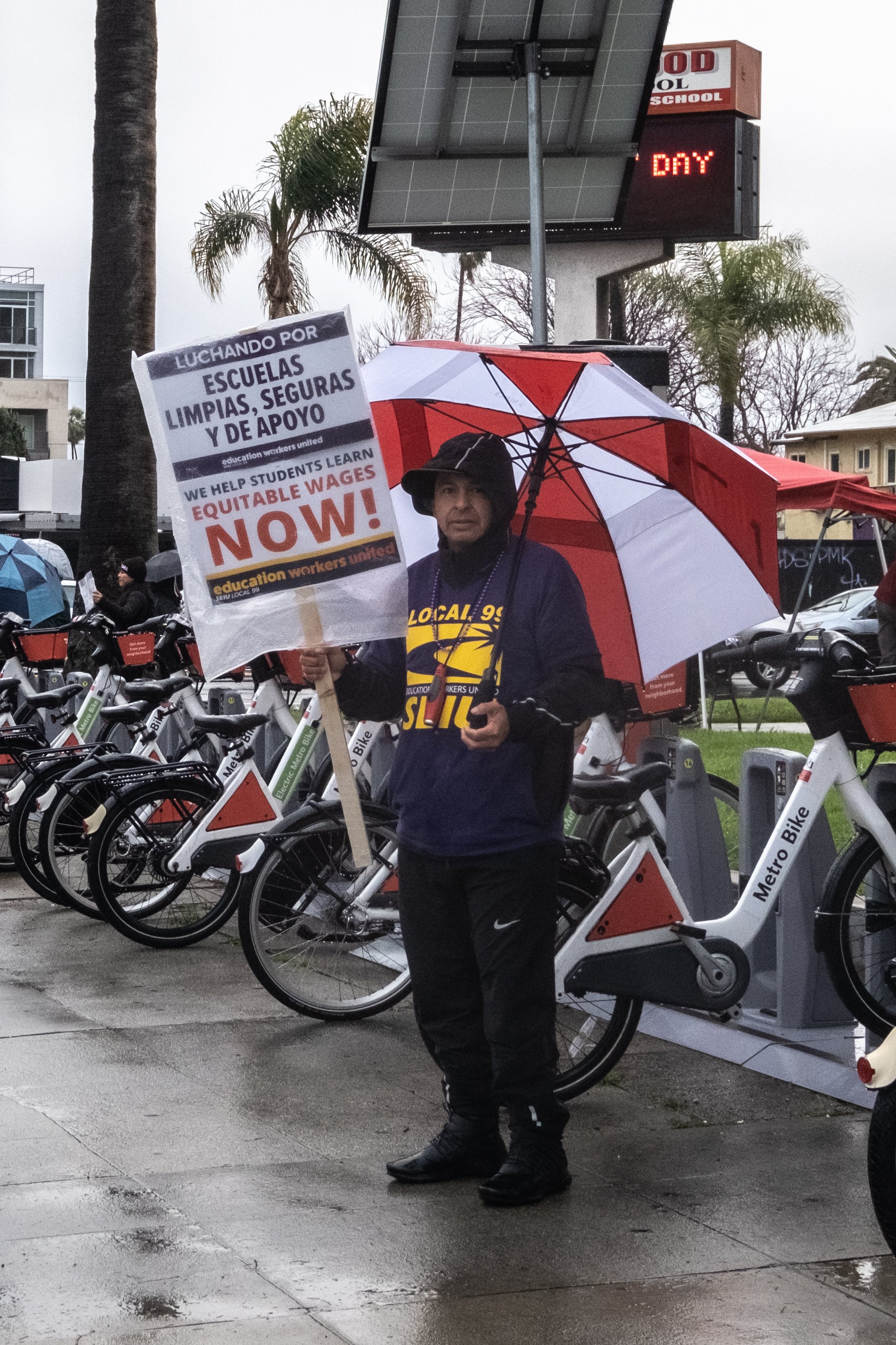  Edwin Sinecio holds a sign supporting Los Angeles Unified School District staff while on strike in front of Hollywood High School, in Los Angeles, Calif. on Tuesday, March 21, 2023. (Akemi Rico | The Corsair) 