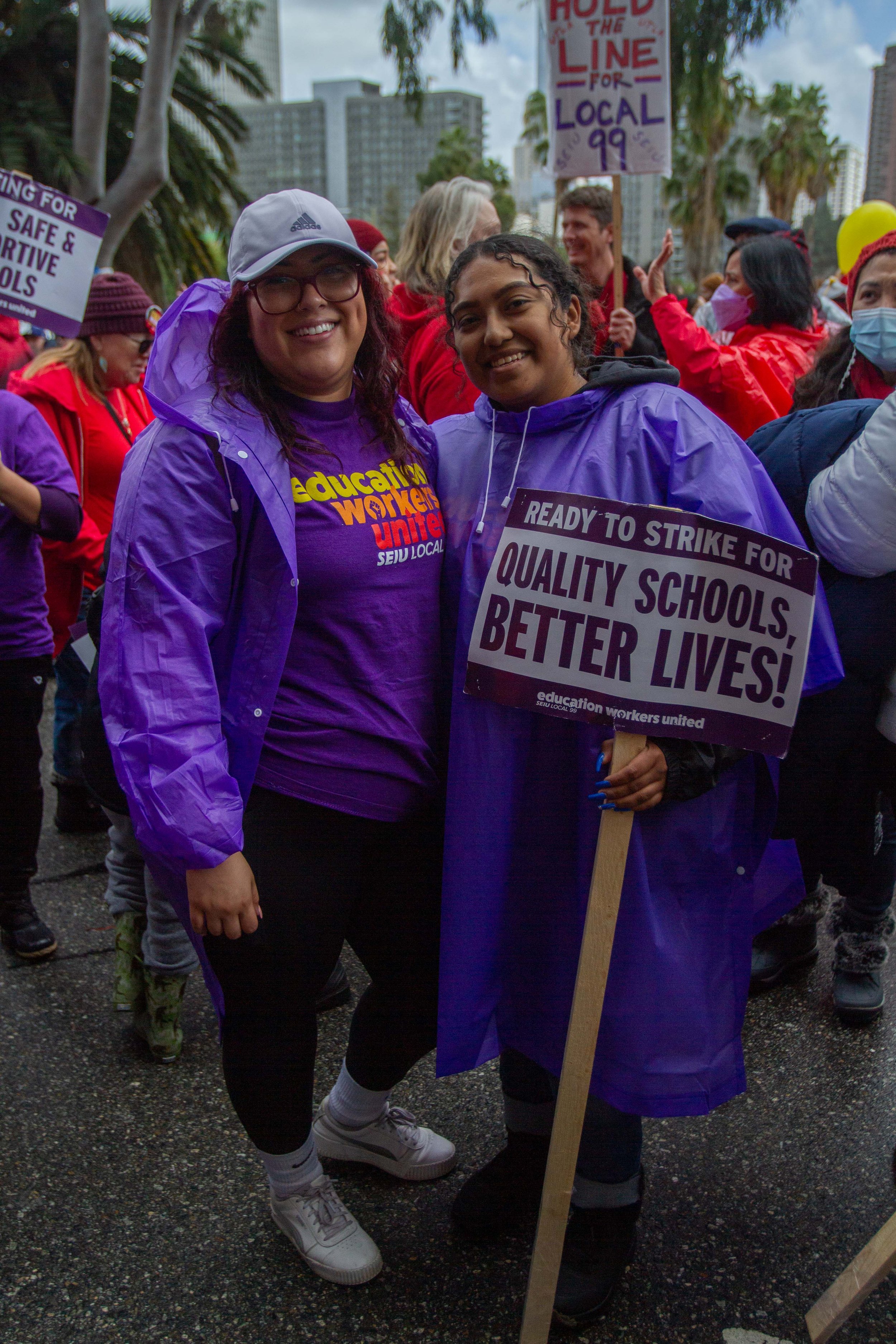  Eva Sosa (left) and Jocylin Ramos (right), protest on Tuesday, March 21, 2023 at the LAUSD headquarters in Downtown L.A. The strike is being lead by SEIU Local 99 members protesting unfair labor practices. (Baleigh O’Brien | The Corsair) 