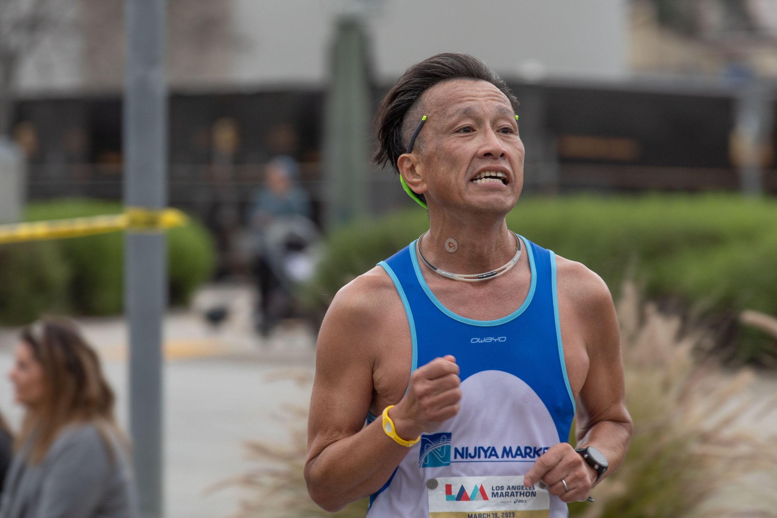  Naoki Kato from Torrance, California, struggles passing on mile 19. Kato finished on 46th place overall on Sunday, March 19, 2023. Los Angeles, Calif. (Jorge Devotto | The Corsair) 