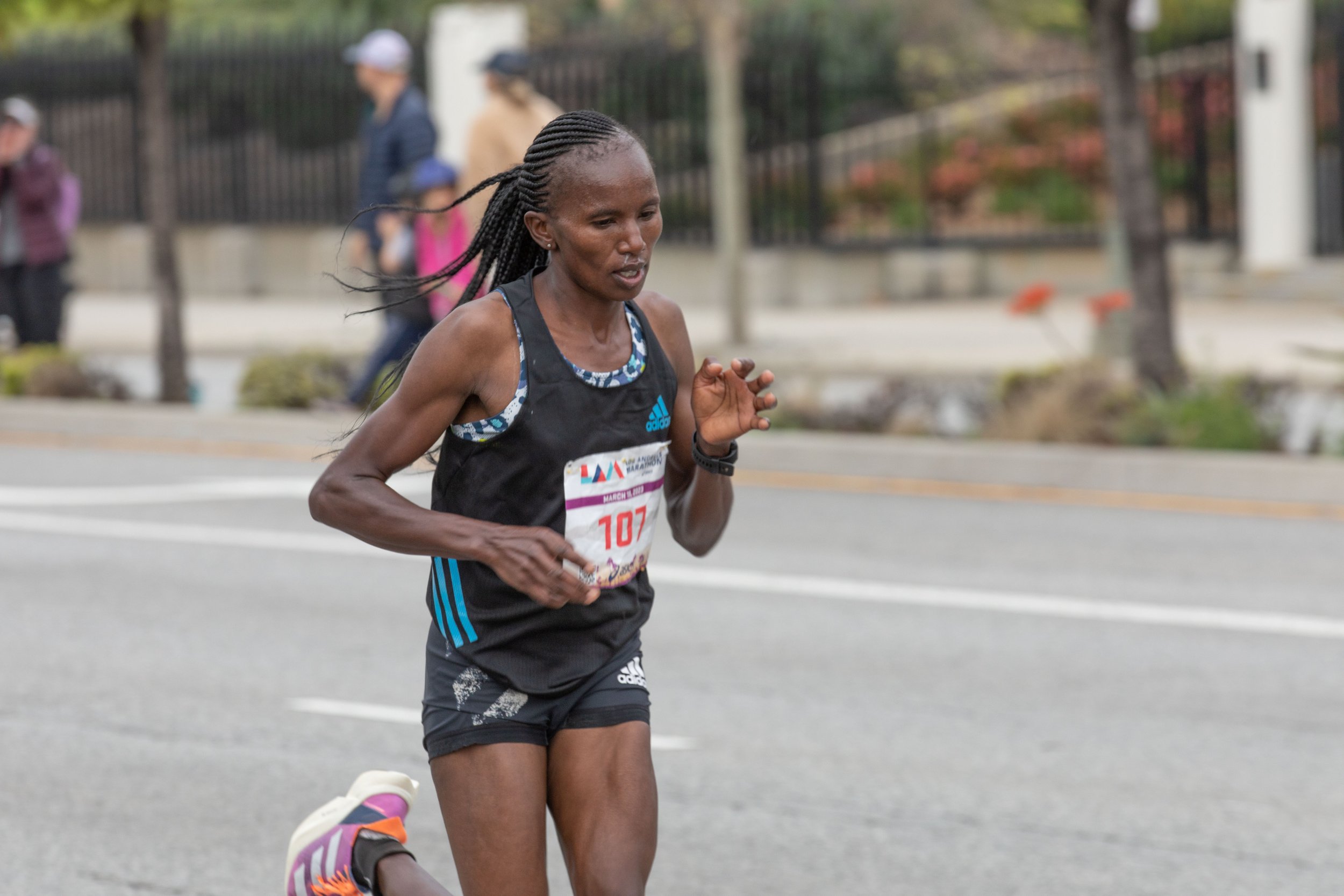  Stacy Ndiwa from Kenya running on Santa Monica Blvd. heading East to the finish line during the L.A. Marathon 2023. Ndiwa won the female competition with a time of 2 hours, 31 minutes, 01 seconds. Sunday, March 19, 2023. Los Angeles, Calif. (Jorge D