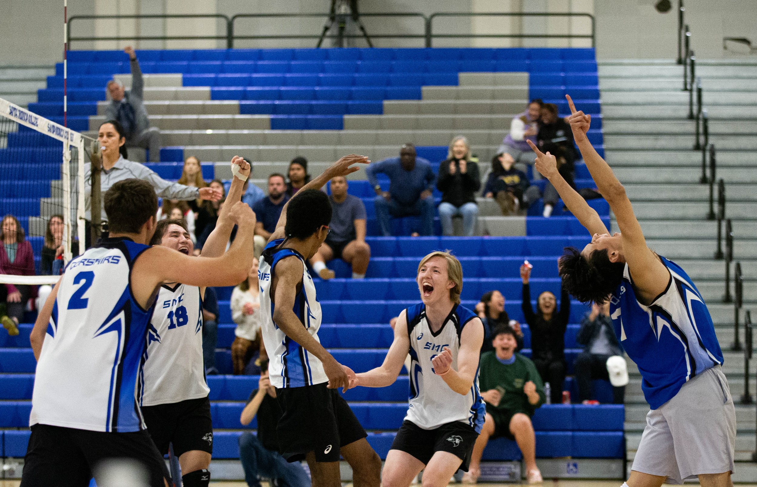 Santa Monica College Corsairs celebrating after Camden Higbee(3) saved the ball and allowed the Corsairs to gain a point against thr Santa Barbara Vaqueros on Fri. March 24 in the Corsair Gym at Santa Monica, Calif. (Danilo Perez | The Corsair) 