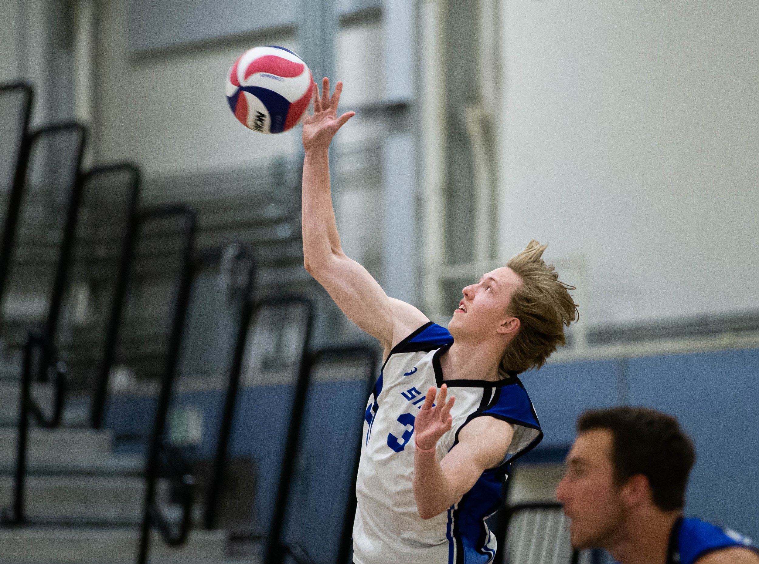  Camden Higbee(3) from Santa monica College serving the ball to beging the play against the Santa Barbara Vaqueros on Fri. March 24 in the Corsair Gym at Santa Monica, Calif. (Danilo Perez | The Corsair) 