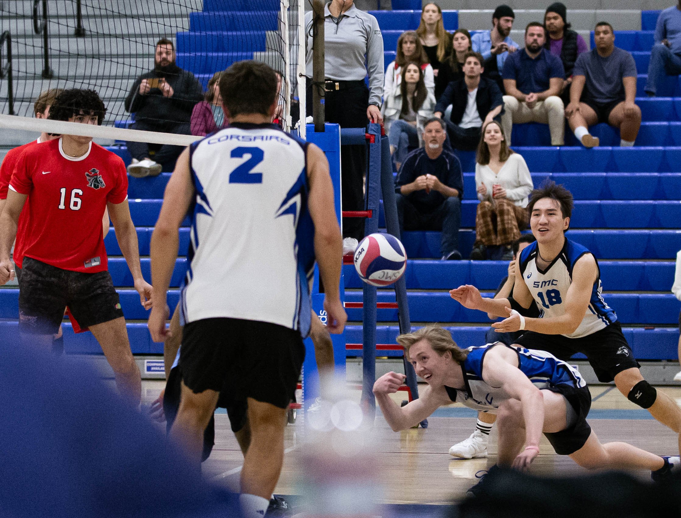  Santa Monica College Corsair setter Camden Higbee(BR) saving the ball from hitting the floor during the Corsairs match against the Santa Barbara Vaqueros on Fri. March 24 in the Corsair Gym at Santa Monica, Calif. (Danilo Perez | The Corsair) 