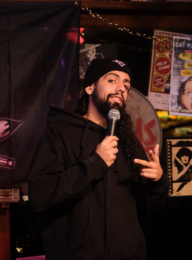  Local comic by the name of A.WON surprisingly stops his set for a few seconds to poses for the camera then return back to the crowd.Maui Sugar Mills Saloon, Los Angeles, on March, Tuesday 14, 2023. (Alejandro Contreras | The Corsair) 