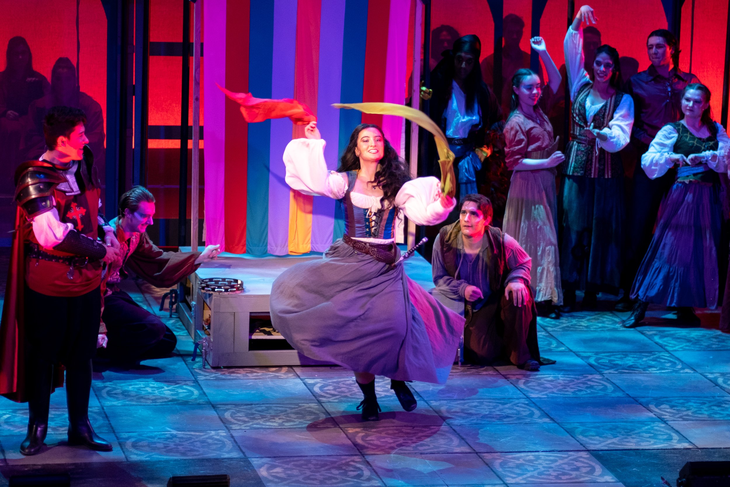  Esmeralda, played by Tayla Sindel, dances with scarves, mesmerizing her audience, in the musical production, The Hunchback of Notre Dame, during rehearsal on Thursday, March 30, 2023 at Santa Monica College Theare Arts and Music Departments Main Sta