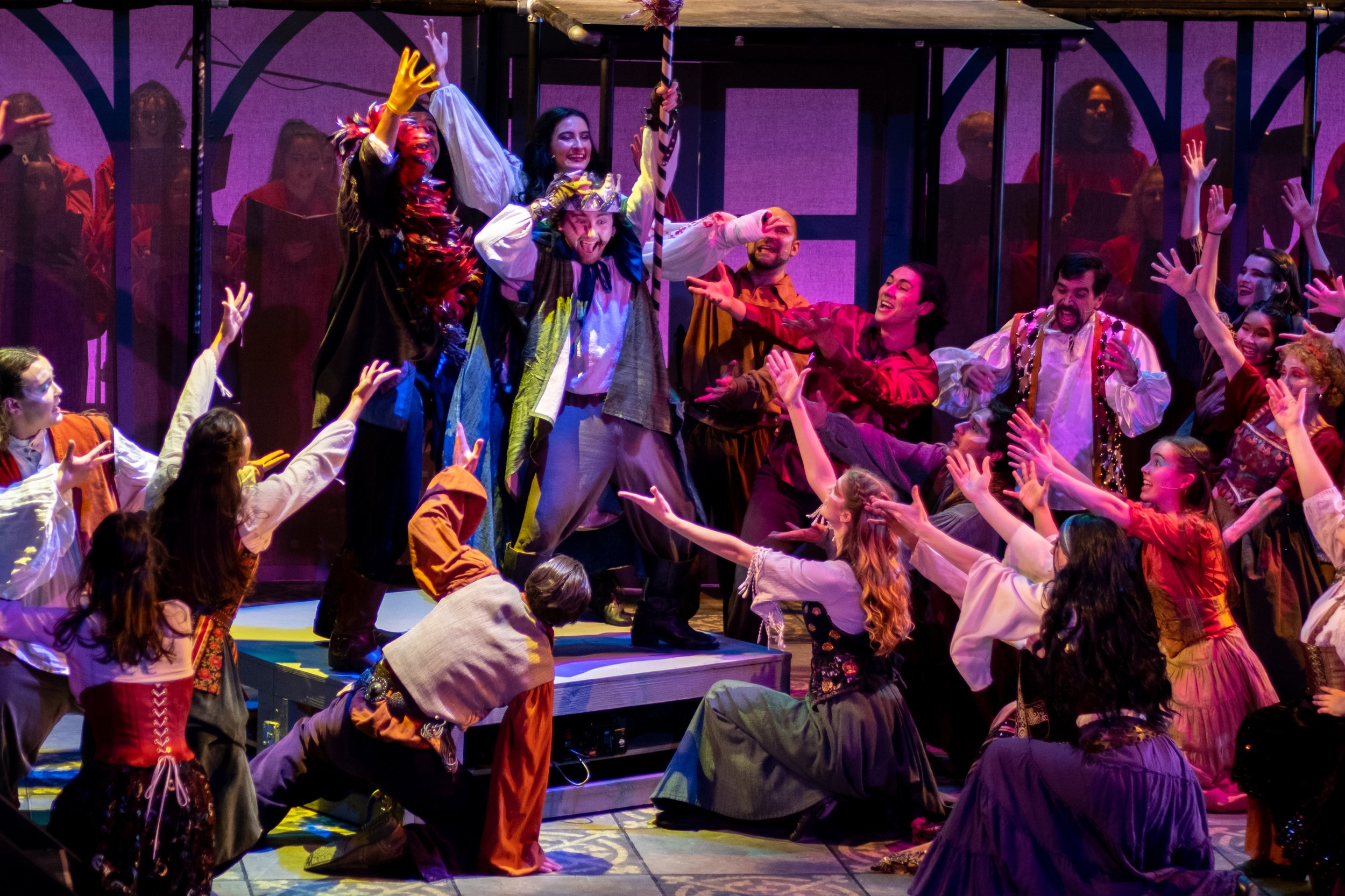  In a celebratory moment, Quasimodo, here played by Elliott Moore, is joyfully crowned the King of Fools on Topsy Turvy Day, in the musical production, The Hunchback of Notre Dame, during rehearsal on Thursday, March 30, 2023 at Santa Monica College 