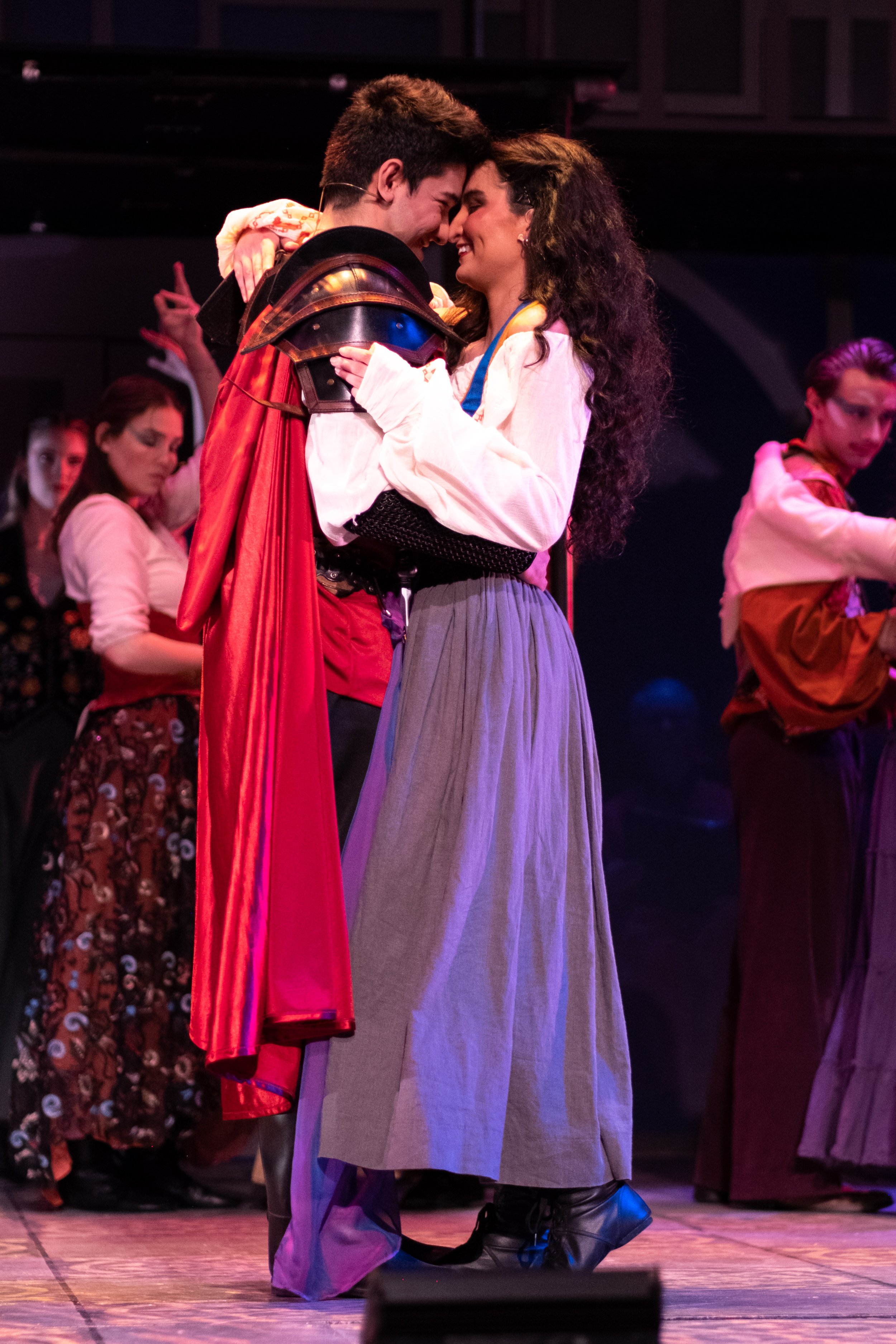 Esmeralda, played by Tayla Sindel, and Captain Phoebus de Martin, played by Joseph Martinez, find themselves in a romantic embrace during the musical production, The Hunchback of Notre Dame, during rehearsal on Thursday, March 30, 2023 at Santa Moni