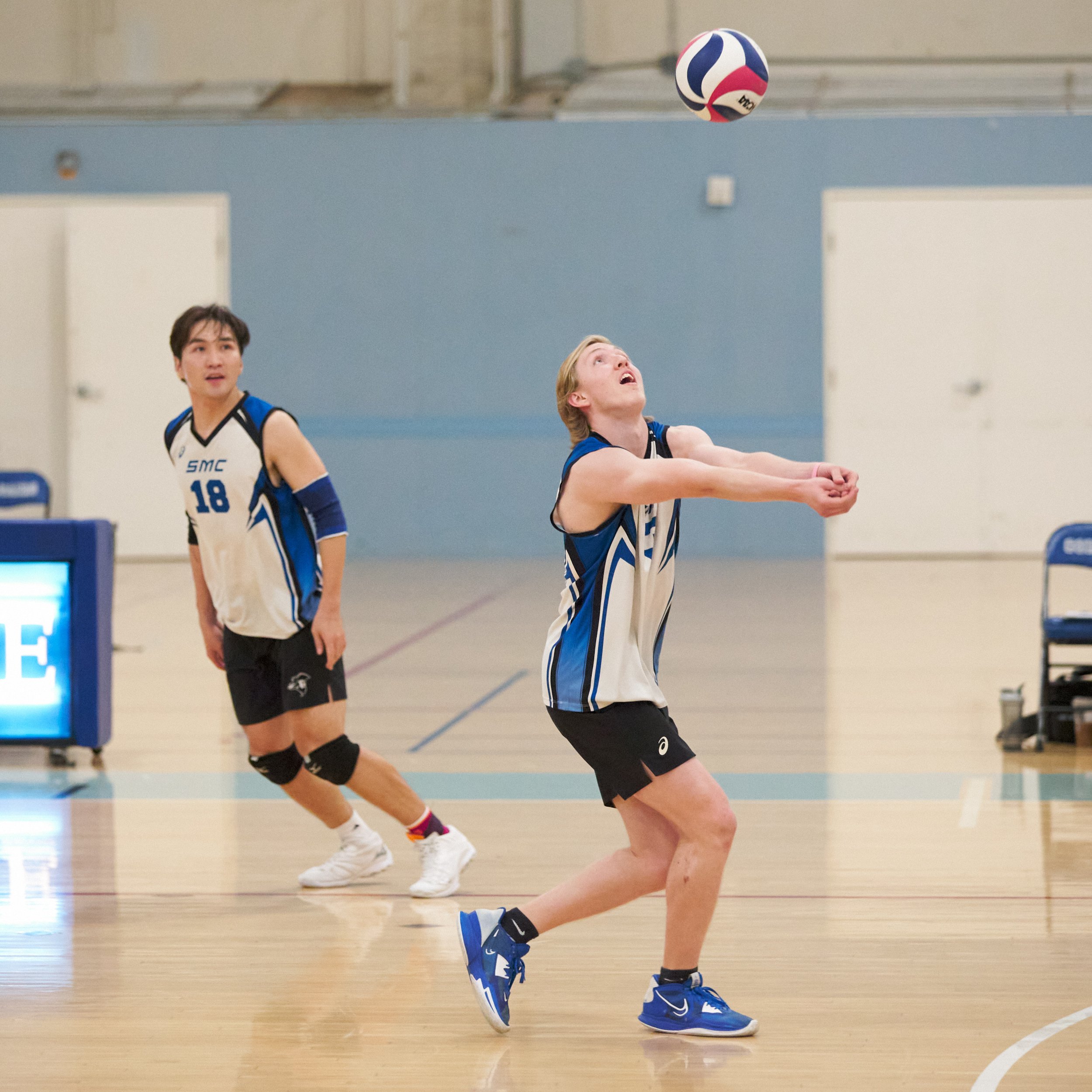  Santa Monica College Corsairs' Camden Higbee (right) bumps the ball, with Enkhtur Tserendavaa (left) behind him during the men's volleyball match against the Moorpark College Raiders on Wednesday, April 12, 2023, at Corsair Gym in Santa Monica, Cali