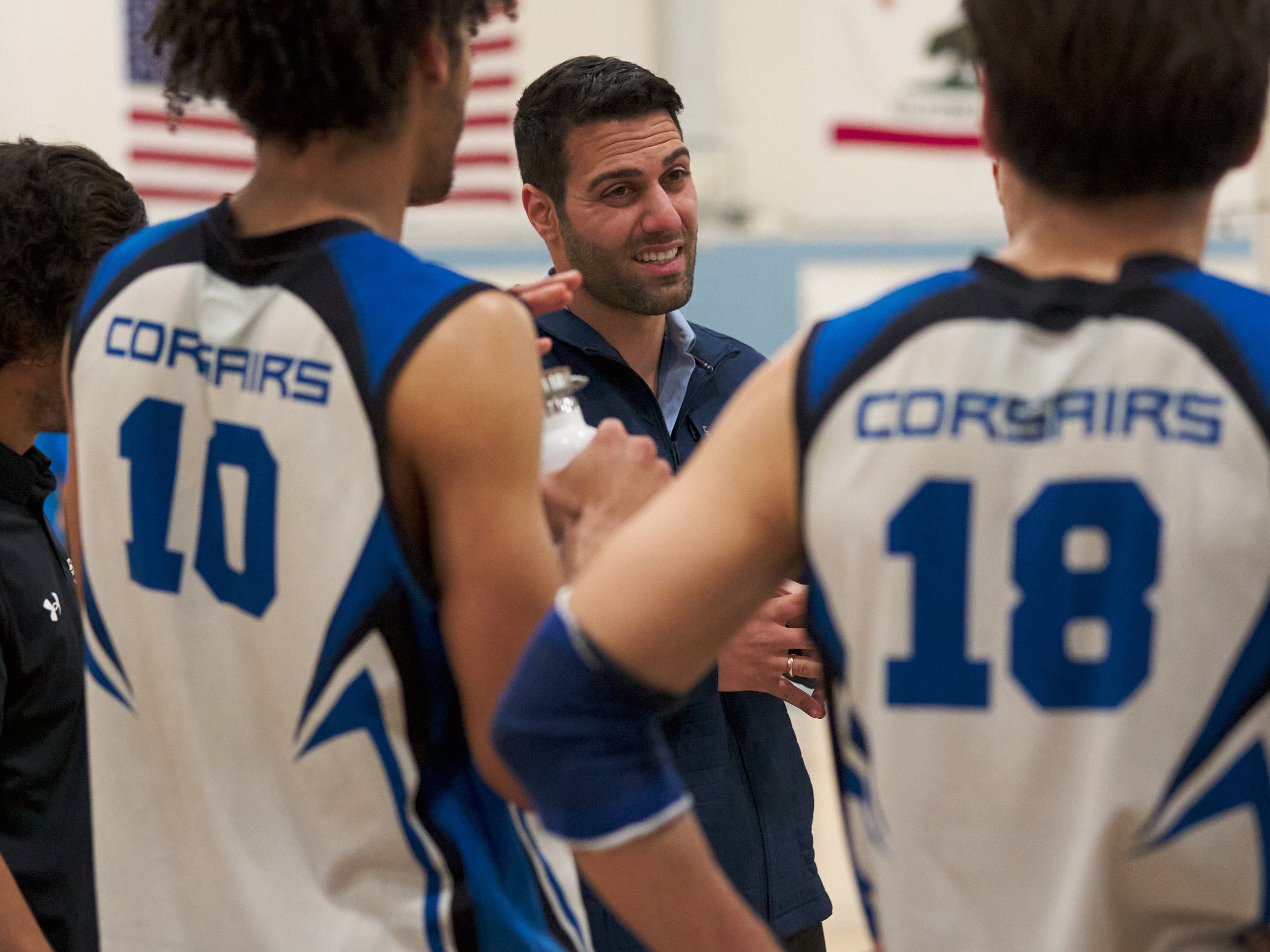  Santa Monica College Corsairs' Men's Volleyball Head Coach Liran Zamir talks to the team during a time out near the end of the third and final set of the men's volleyball match against the Moorpark College Raiders on Wednesday, April 12, 2023, at Co
