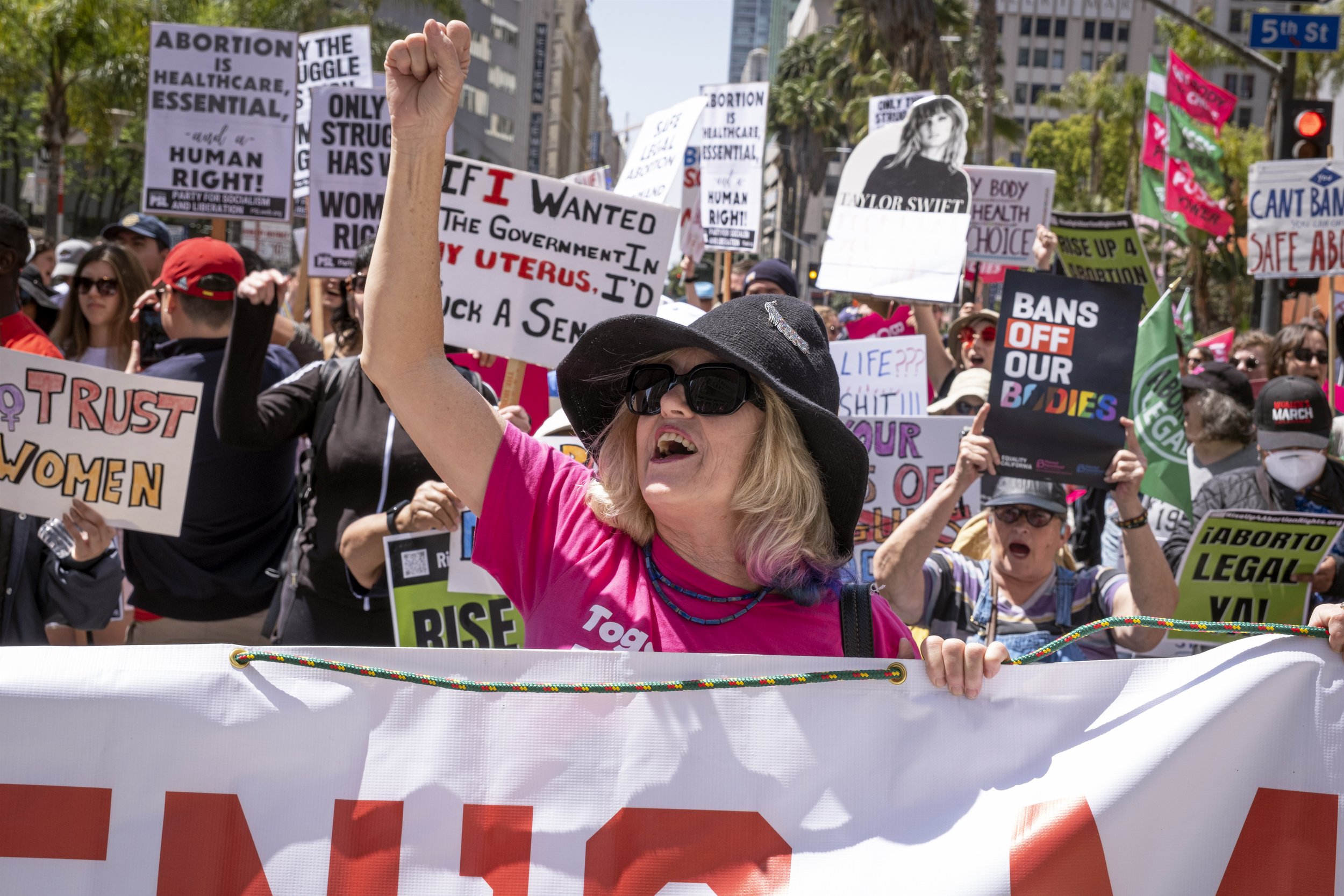  A demonstrator holds a sign while shouting at the Women’s March gathering at Pershing Square in Los Angeles, Calif. on Saturday, April 15, 2023. (Anna Sophia Moltke | The Corsair) 