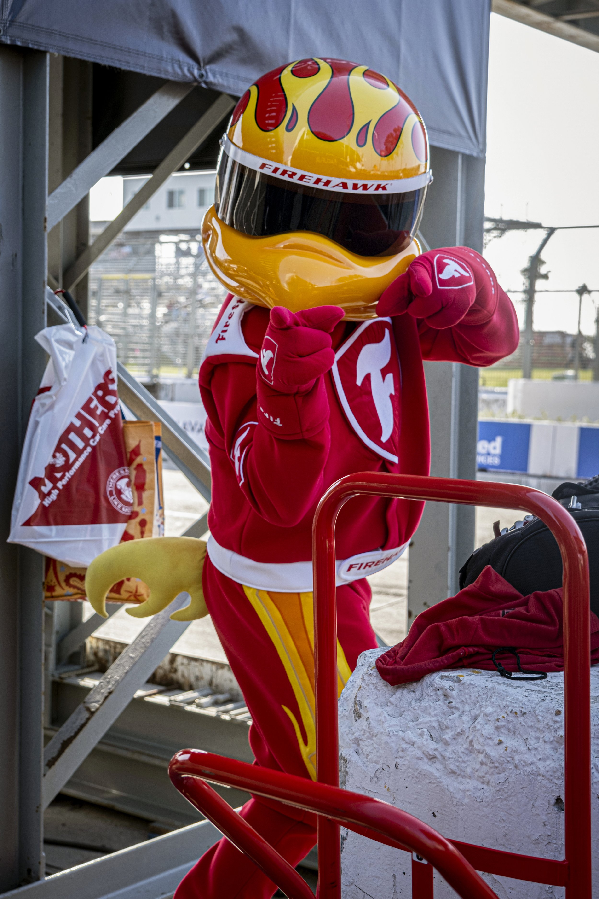  Firestone mascot points and poses in the pit of the 48th Annual Acura Grand Prix in Long Beach, Calif. on Sat., April 15, 2023. (Anna Sophia Moltke | The Corsair) 