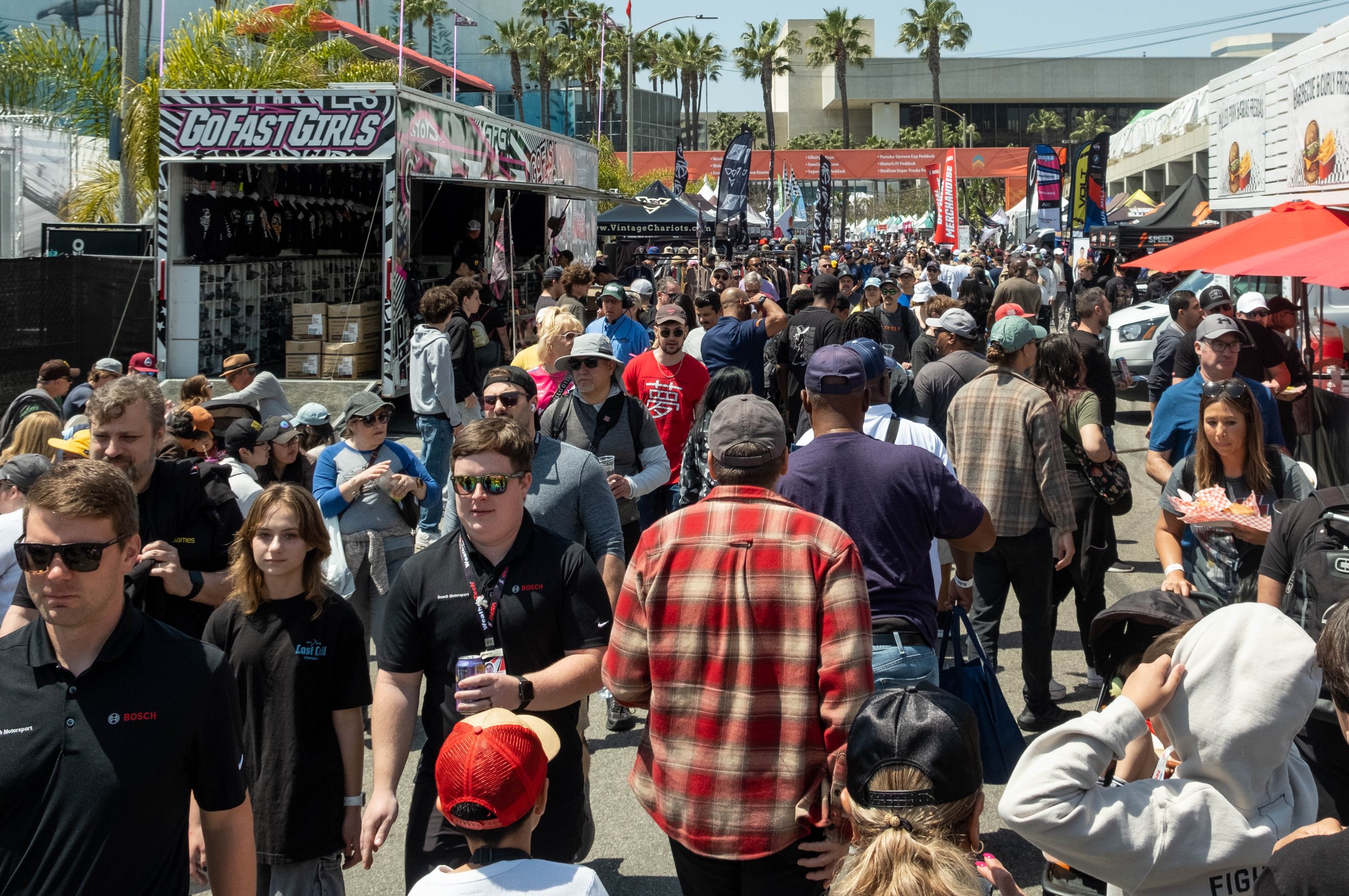  Acura Grand Prix attendees walking through booths and food to refuel for the day on Saturday, April 15 at Long Beach, Calif. (Danilo Perez | The Corsair) 