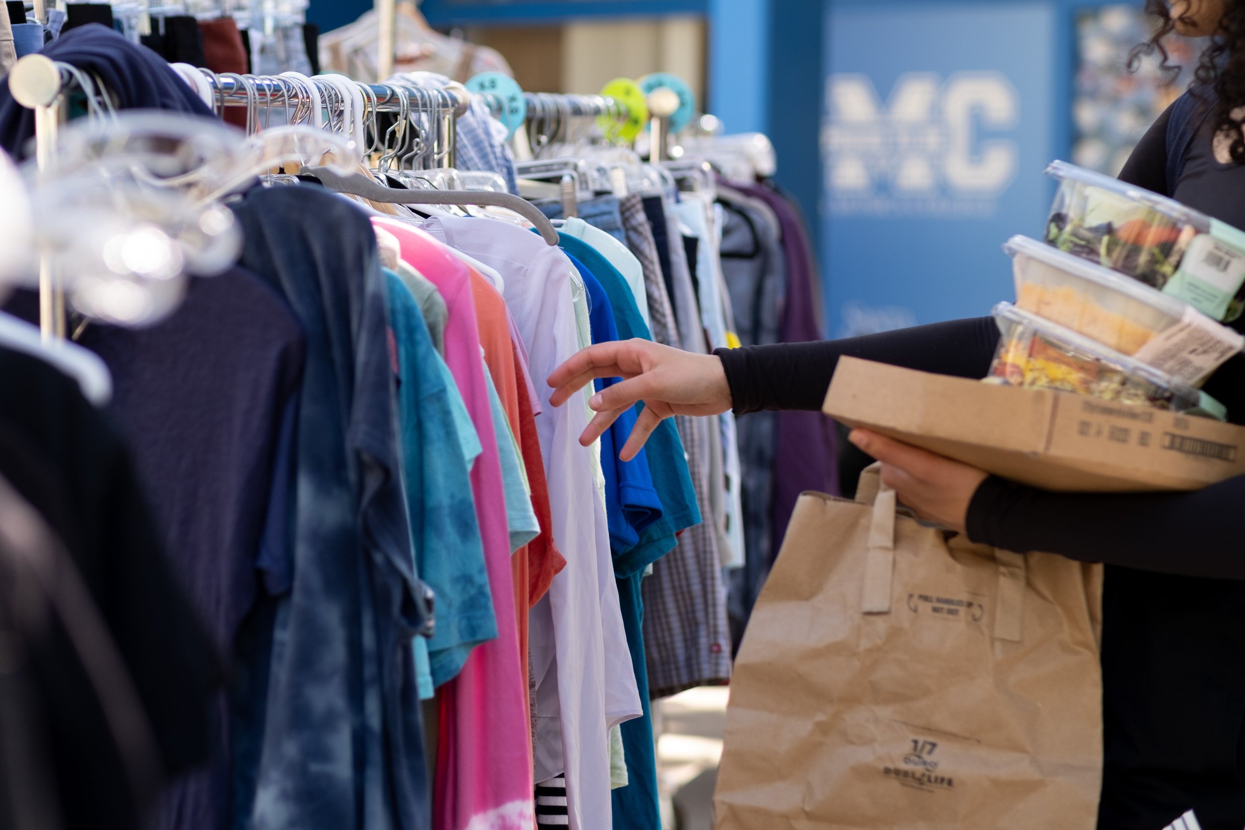  The Bodega is open, displaying clothes on racks in front of the food pantry next to the cafeteria on the Main Campus at Santa Monica College on Friday, April 21, 2023,  in Santa Monica, Calif. Students can take what they need. (Akemi Rico | The Cors