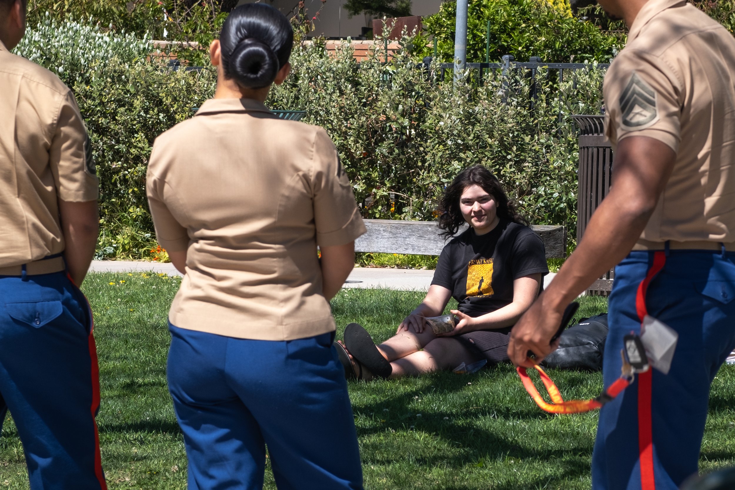  Laura Brown, Santa Monica College (SMC) student and Theater Arts and Sustainability major, chats with Marines while eating lunch on the main campus on Friday, April 21, 2023,  in Santa Monica, Calif. (Akemi Rico | The Corsair) 