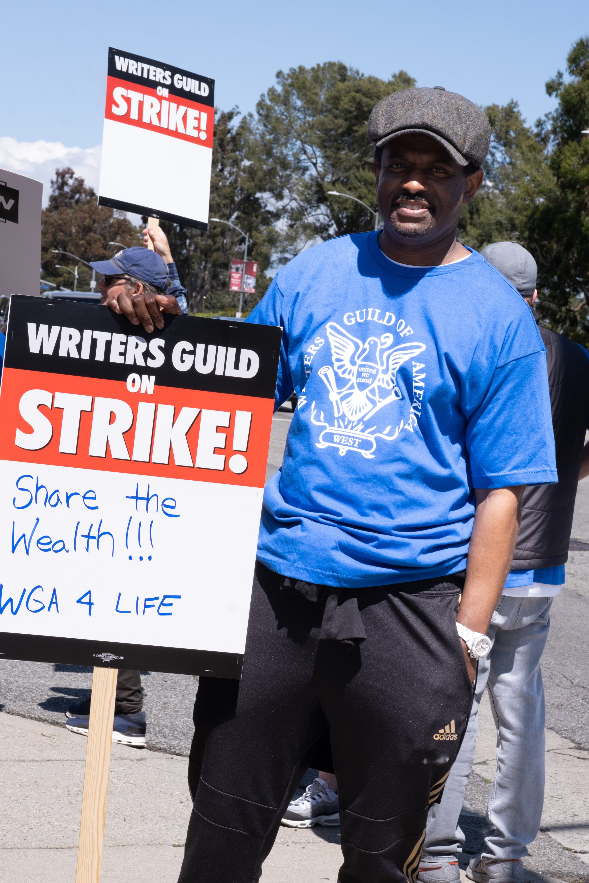  Matt Claybrooks, a writer and member of the Writers Guild of America, participates in the protests supporting the WGA strike in front of Fox Studios on Pico Blvd in Los Angeles, Calif. on Tuesday May 2nd, 2023. He states, "We were there last night u