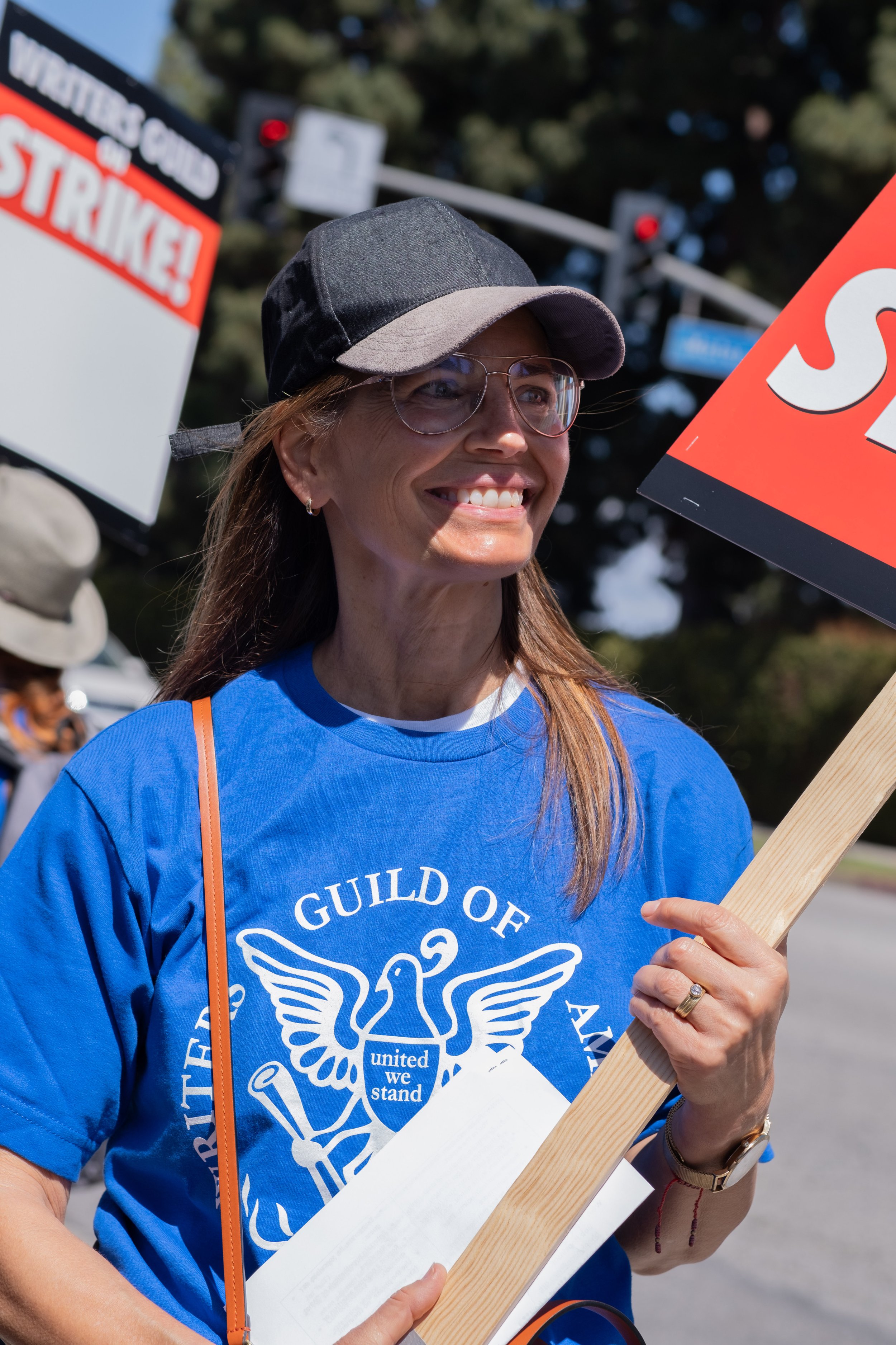  Susannah Grant, screenwriter and television writer for over 20 years, participates in the protests supporting the Writers Guild of America strike in front of Fox Studios on Pico Blvd in Los Angeles, Calif. on Tuesday May 2nd, 2023. (Akemi Rico | The