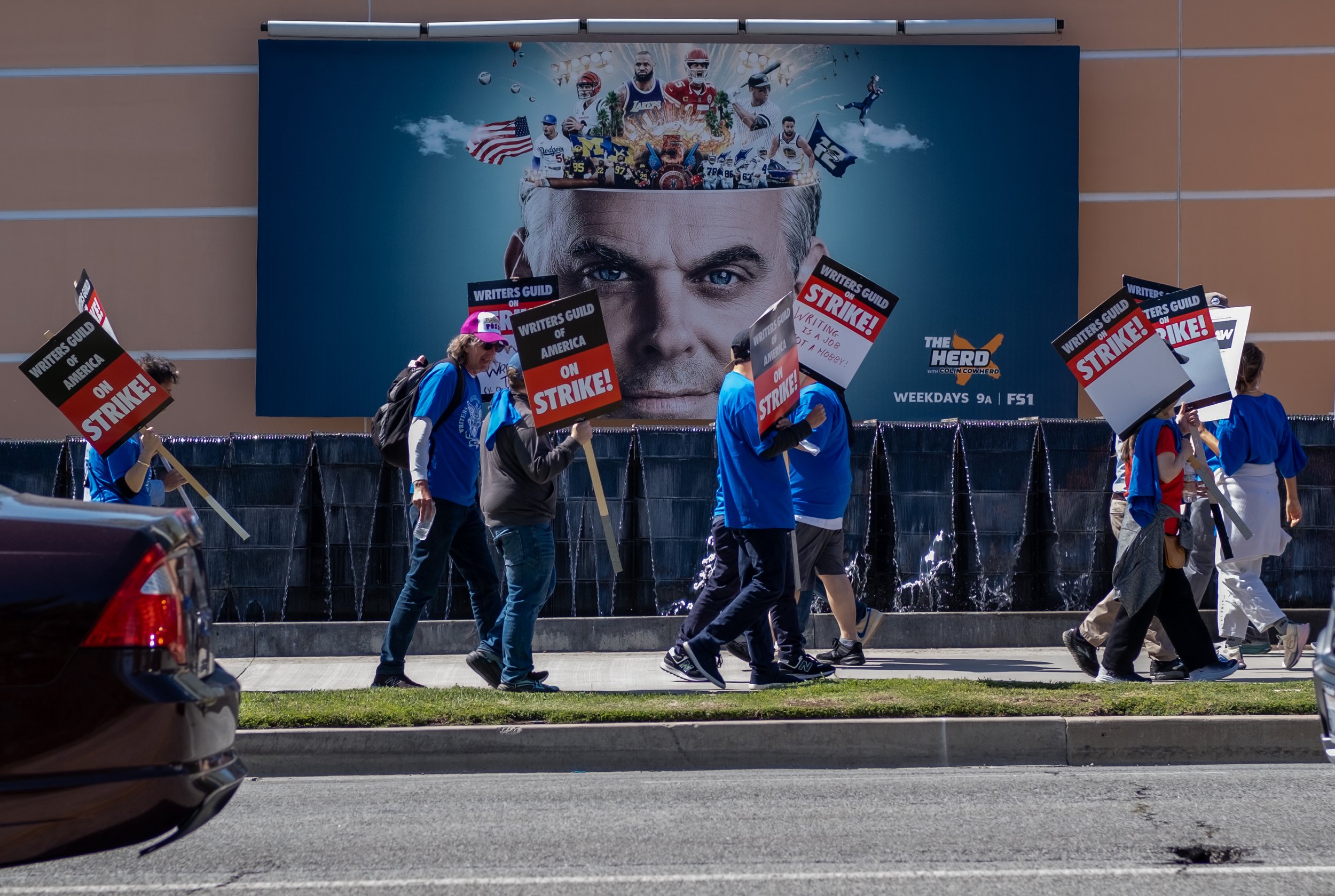  May 2nd, 2023 marks the first time the Writers Guild of America (WGA) has gone on strike since 2007. Protesters march in front of Fox Studios on Pico Blvd in Los Angeles, Calif. holding signs and wearing blue t-shirts showing support for the WGA. (A