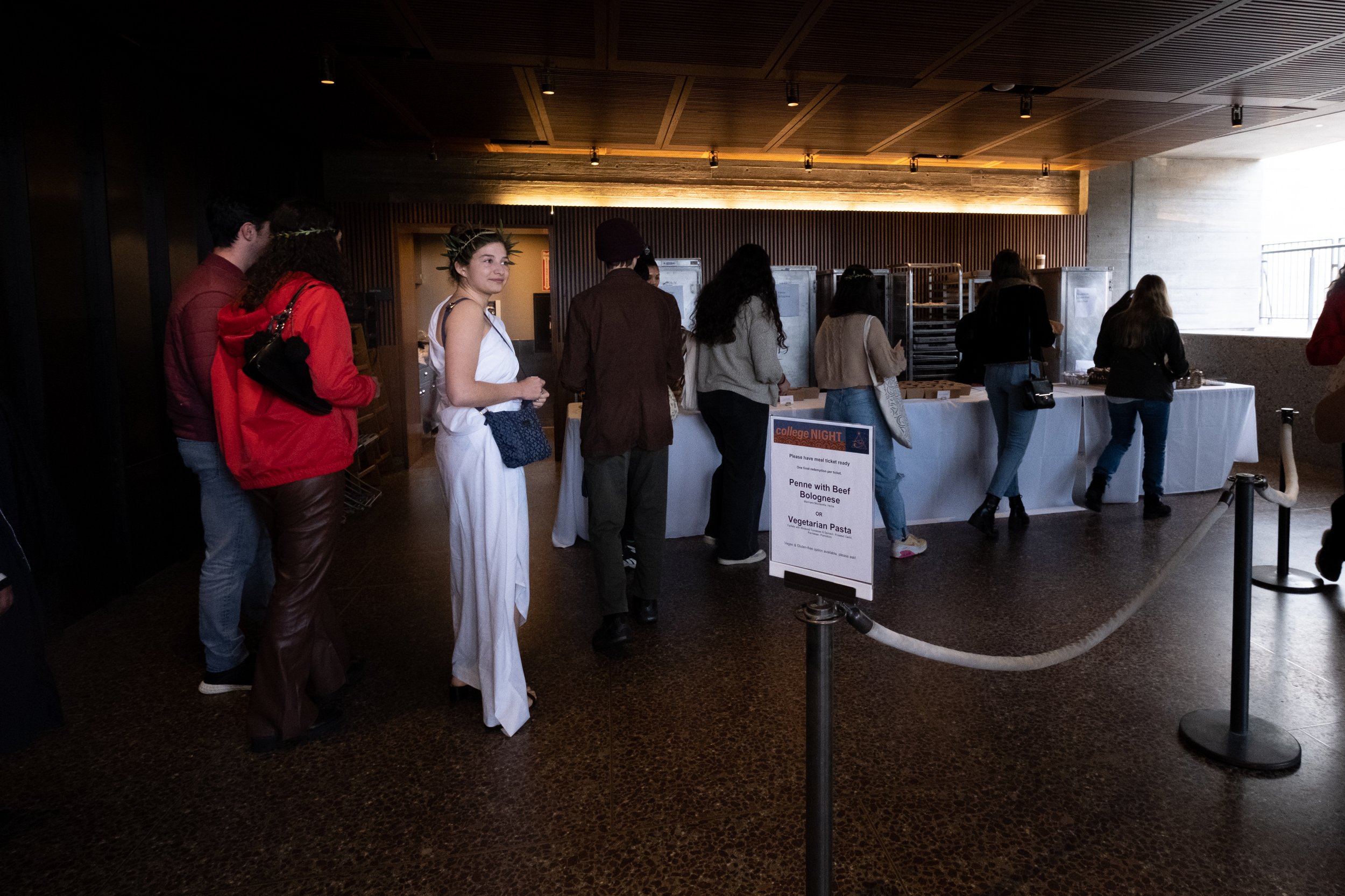  Students from various Southern California colleges wait in line for dinner at College Night at the Getty Villa  in Pacific Palisades, Calif. on Wednesday, March 22, 2023 at College Night. Students were invited to come dressed in costume. On the menu