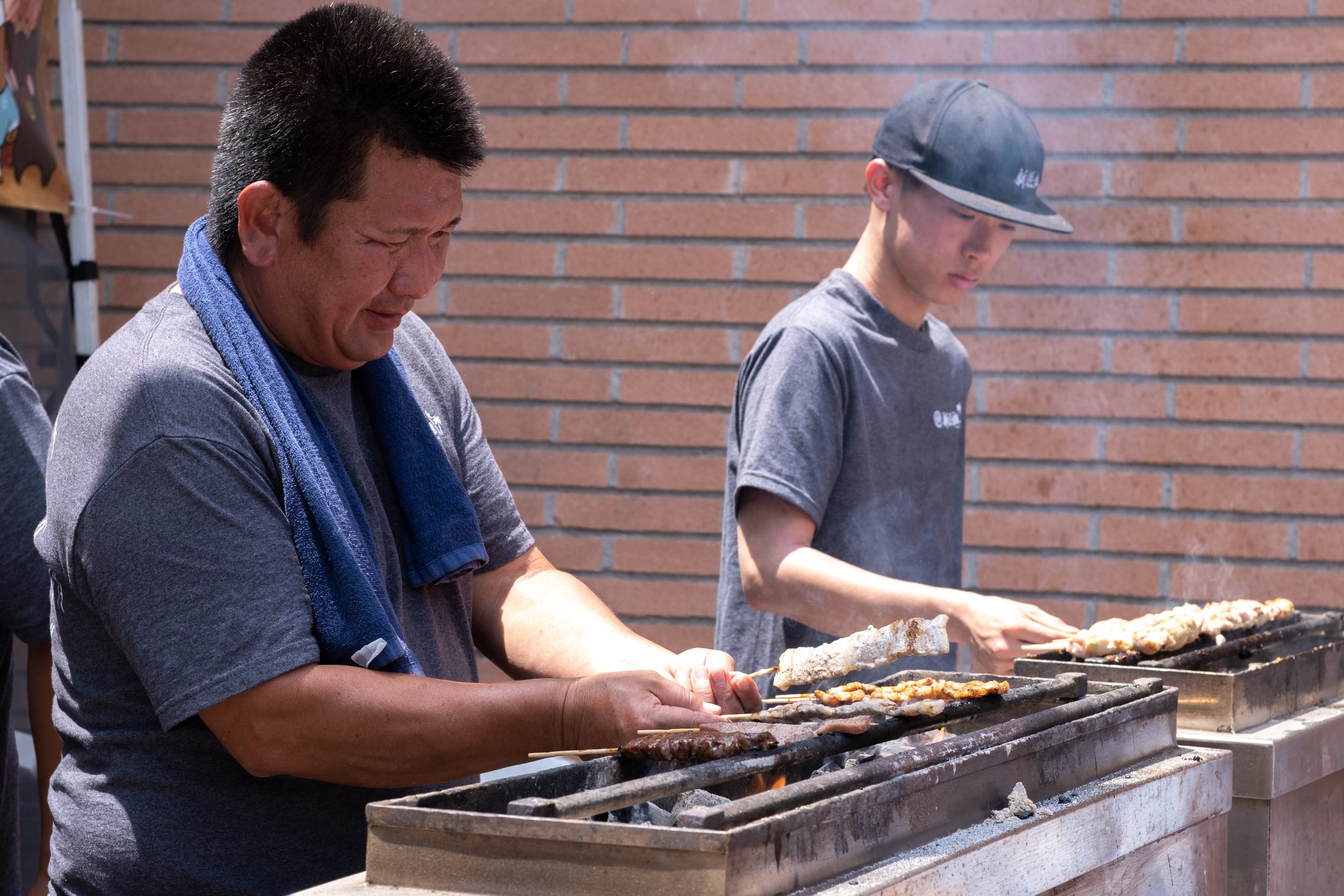  Food booths prepared many types of traditional Japanese food. Shown here is "yakitori," barbecued meat on skewers, at the Torrance Cultural Arts Center in Torrance, Calif., at the Weekly LALALA 20th Anniversary event on Sunday, May 14th, 2023. (Akem