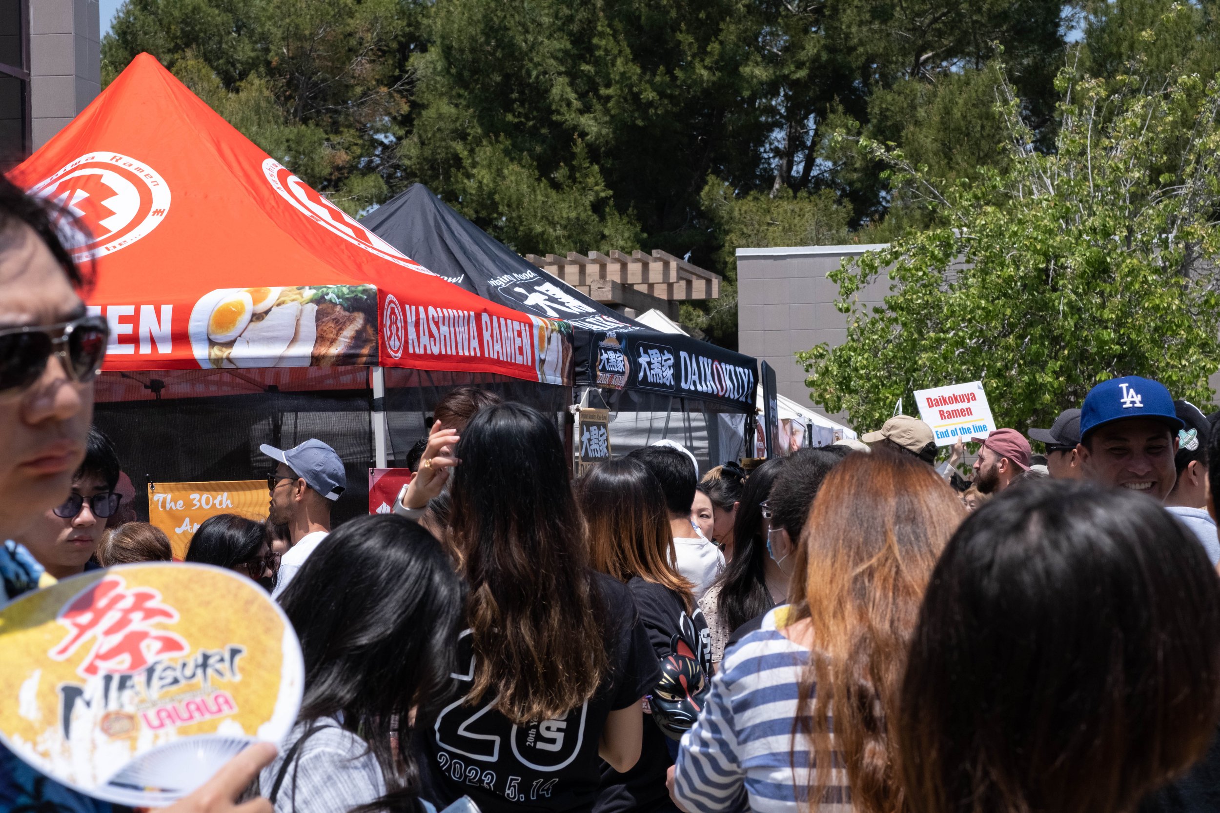  Inside the grounds at the Torrance Cultural Arts Center in Torrance, Calif., festival goers of all ages waited in line for different types of ramen noodles at the Weekly LALALA 20th Anniversary event on Sunday, May 14th, 2023. (Akemi Rico | The Cors